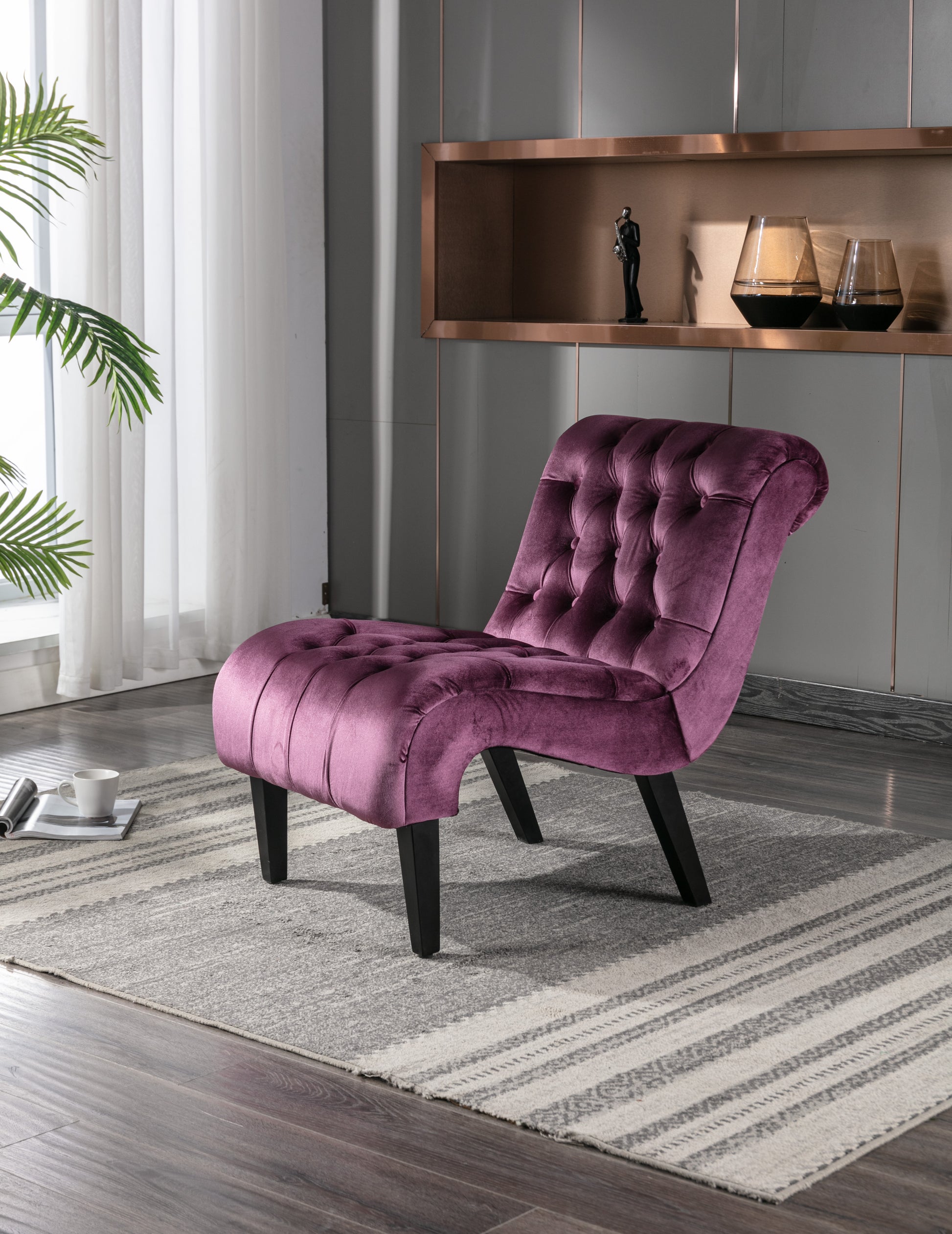 Tufted purple velvet slipper chair with dark wood legs perfect accent piece