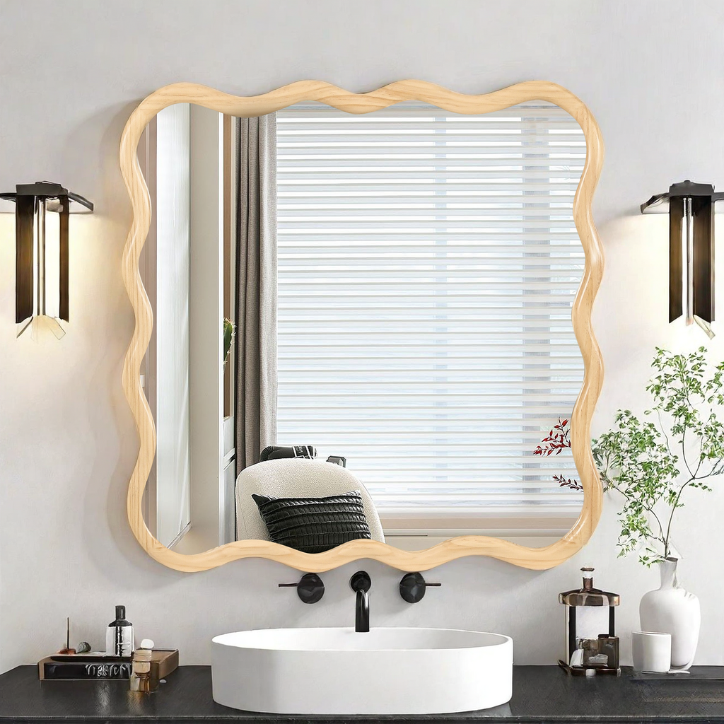 Wavyedged wooden framed mirror above a white sink a stylish vanity piece