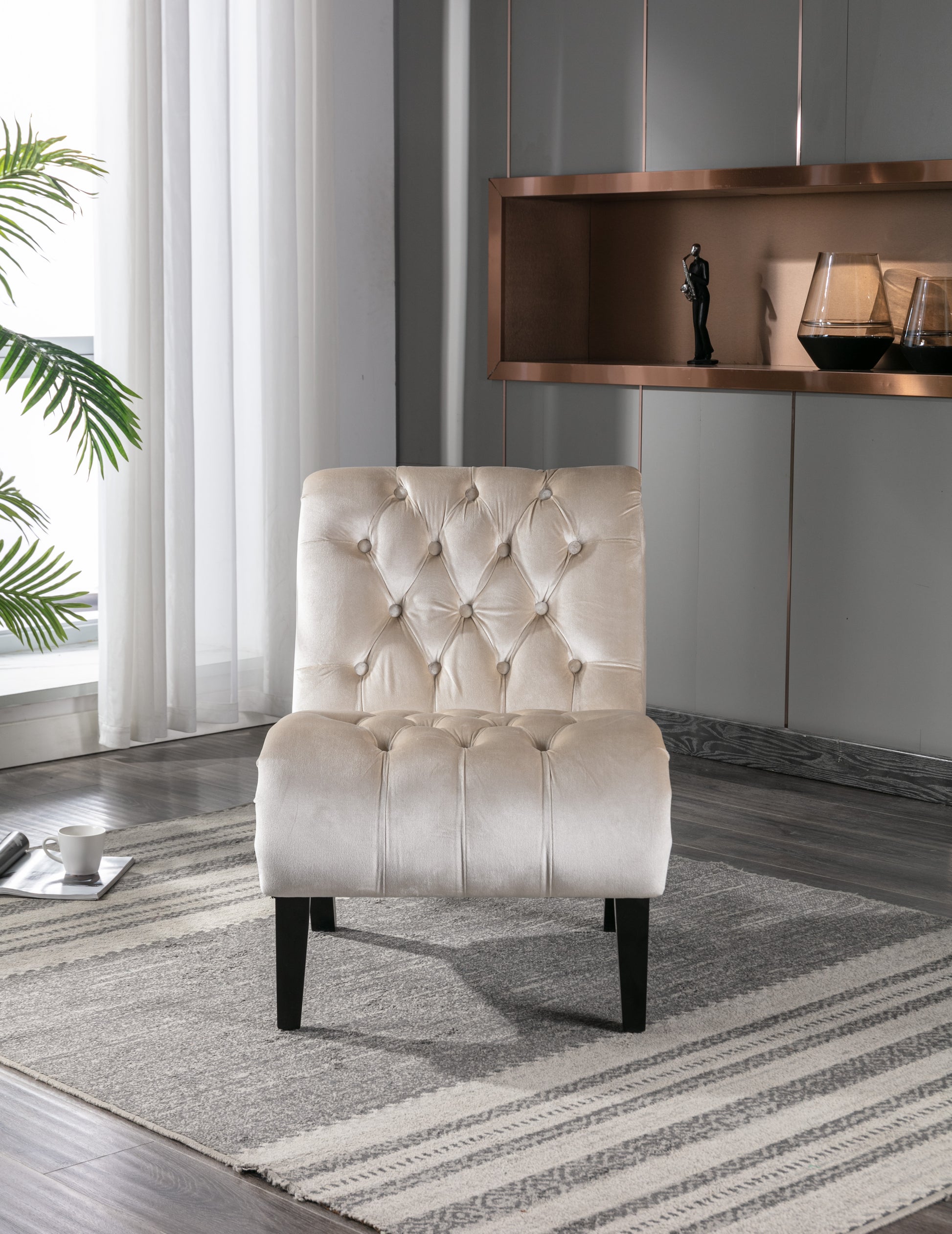 Elegant cream velvet accent chair with diamond tufting and dark wooden legs