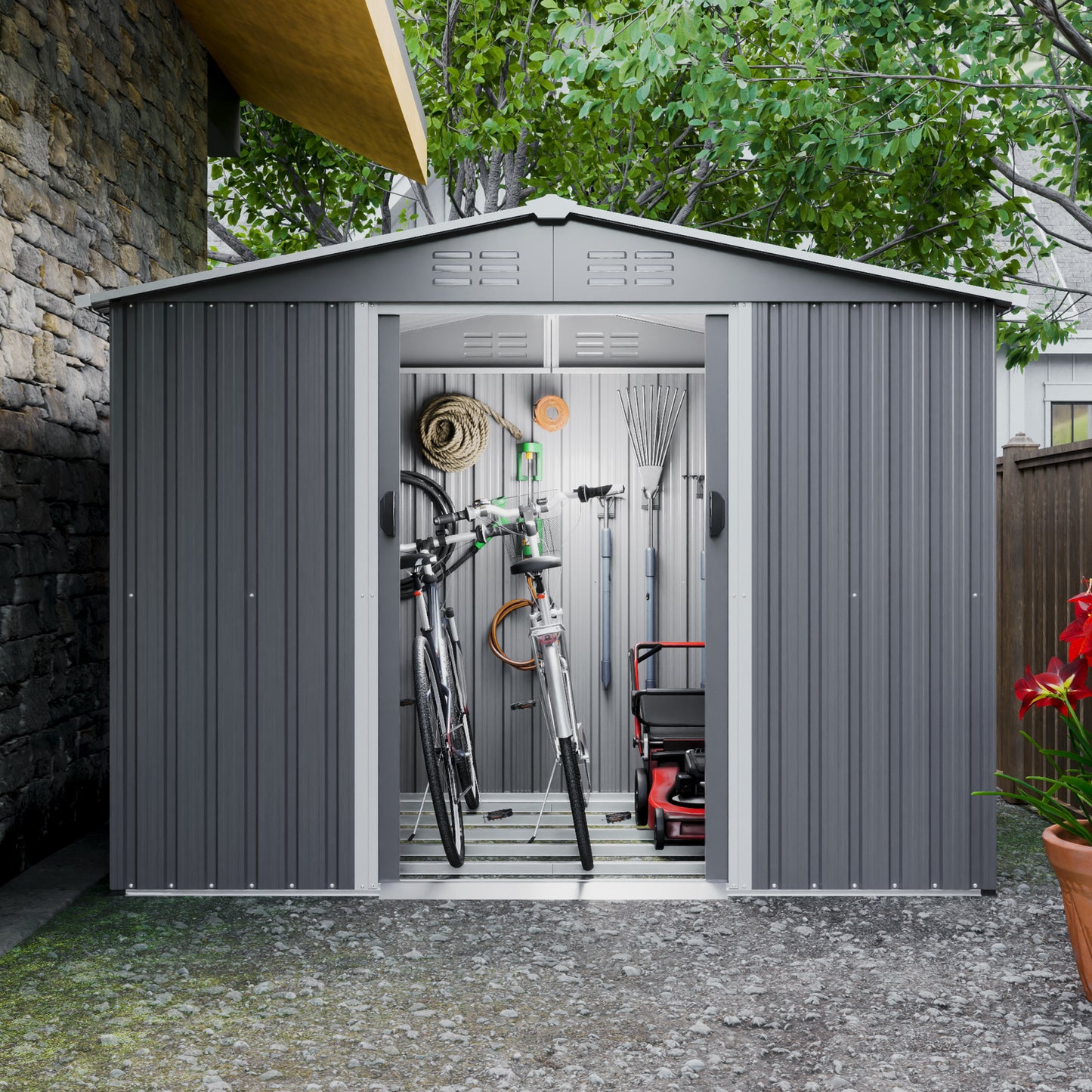 Gray metal storage shed with two bicycles a lawnmower and garden tools inside