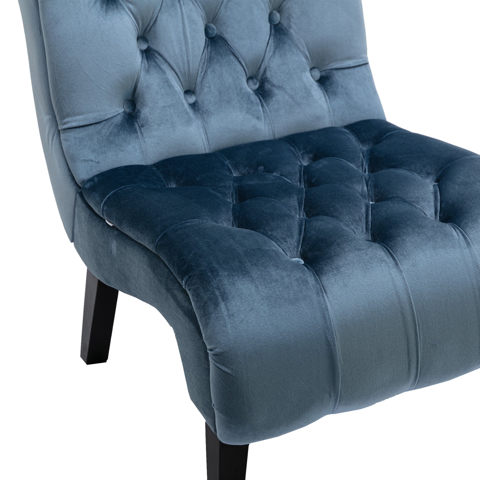 Tufted blue velvet accent chair with elegant button details and a modern silhouette