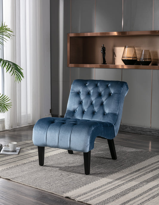 Tufted blue velvet slipper chair with elegant button detailing for a stylish accent