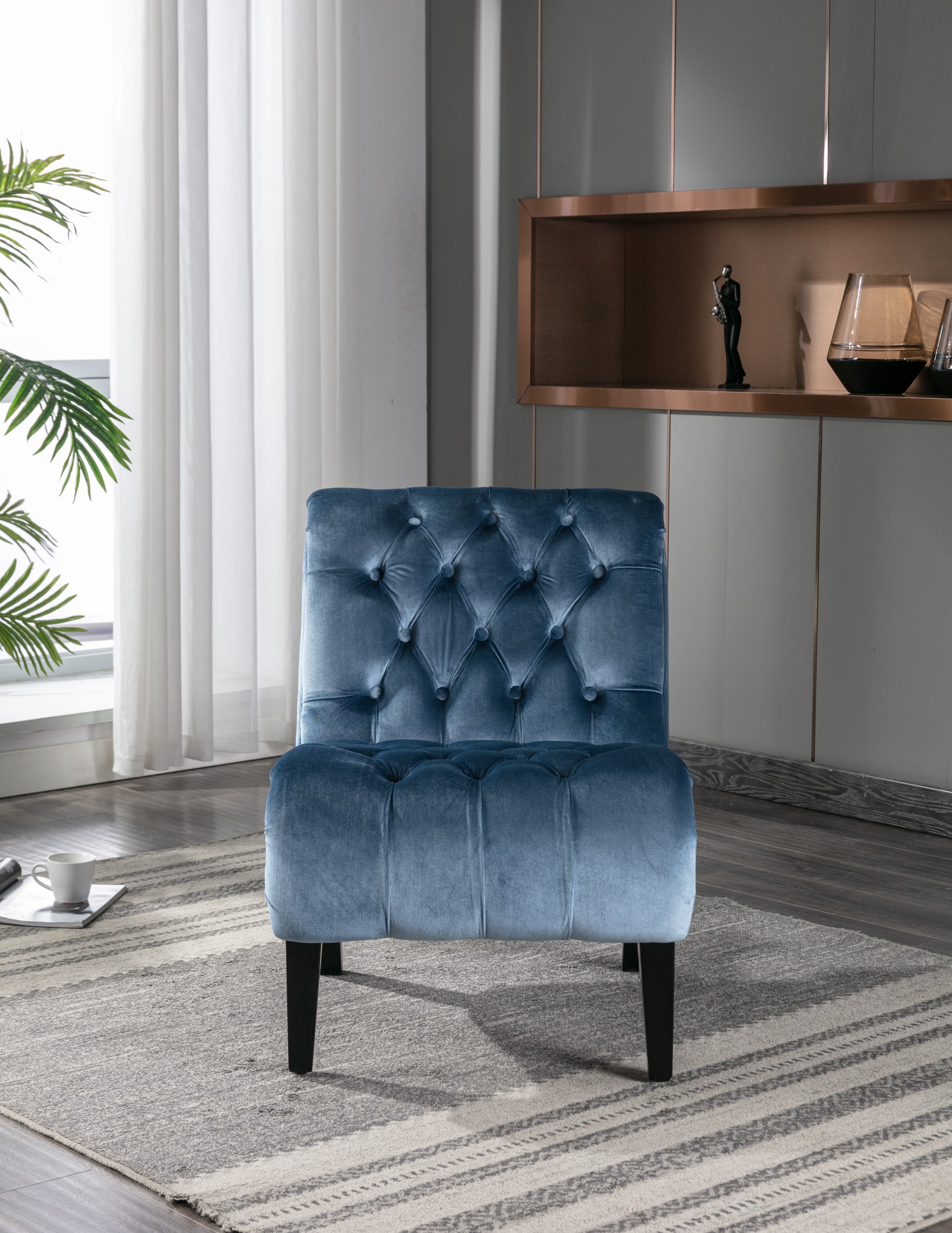 Tufted teal velvet accent chair with diamond stitch back and seat