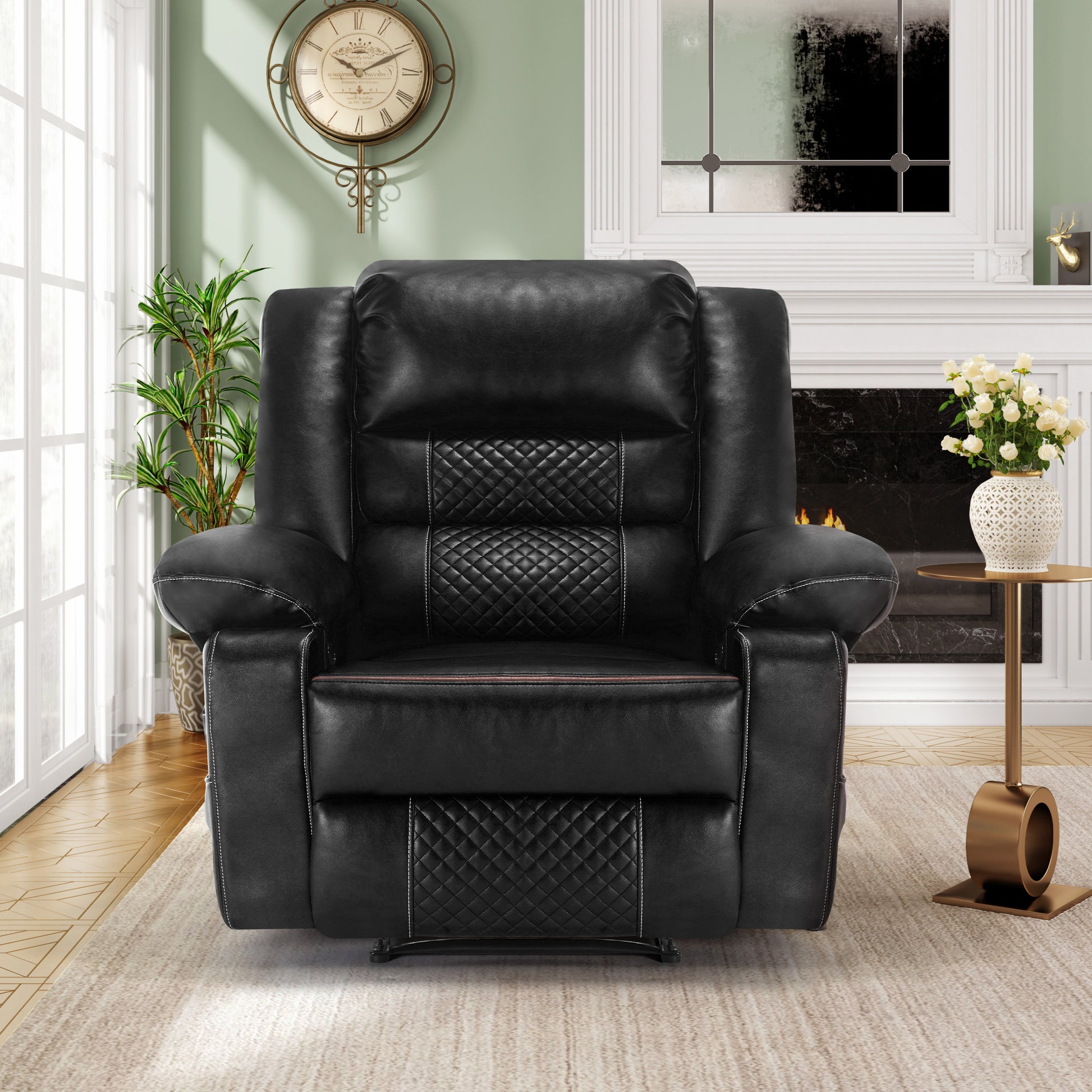 Black leather recliner with quilted diamond stitching on back and seat for ultimate comfort
