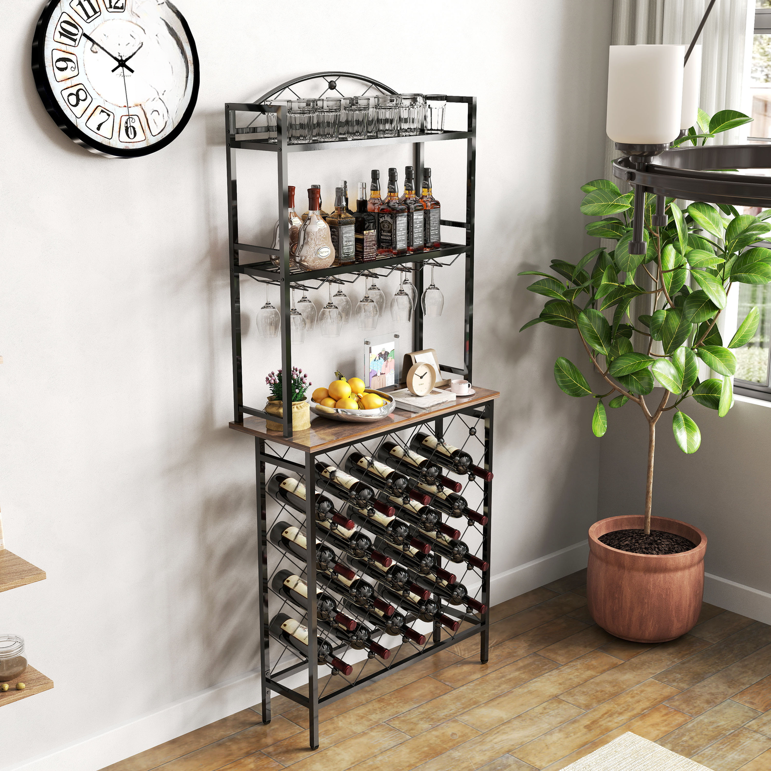 Black metal wine rack with glass holders bottles and fruit display