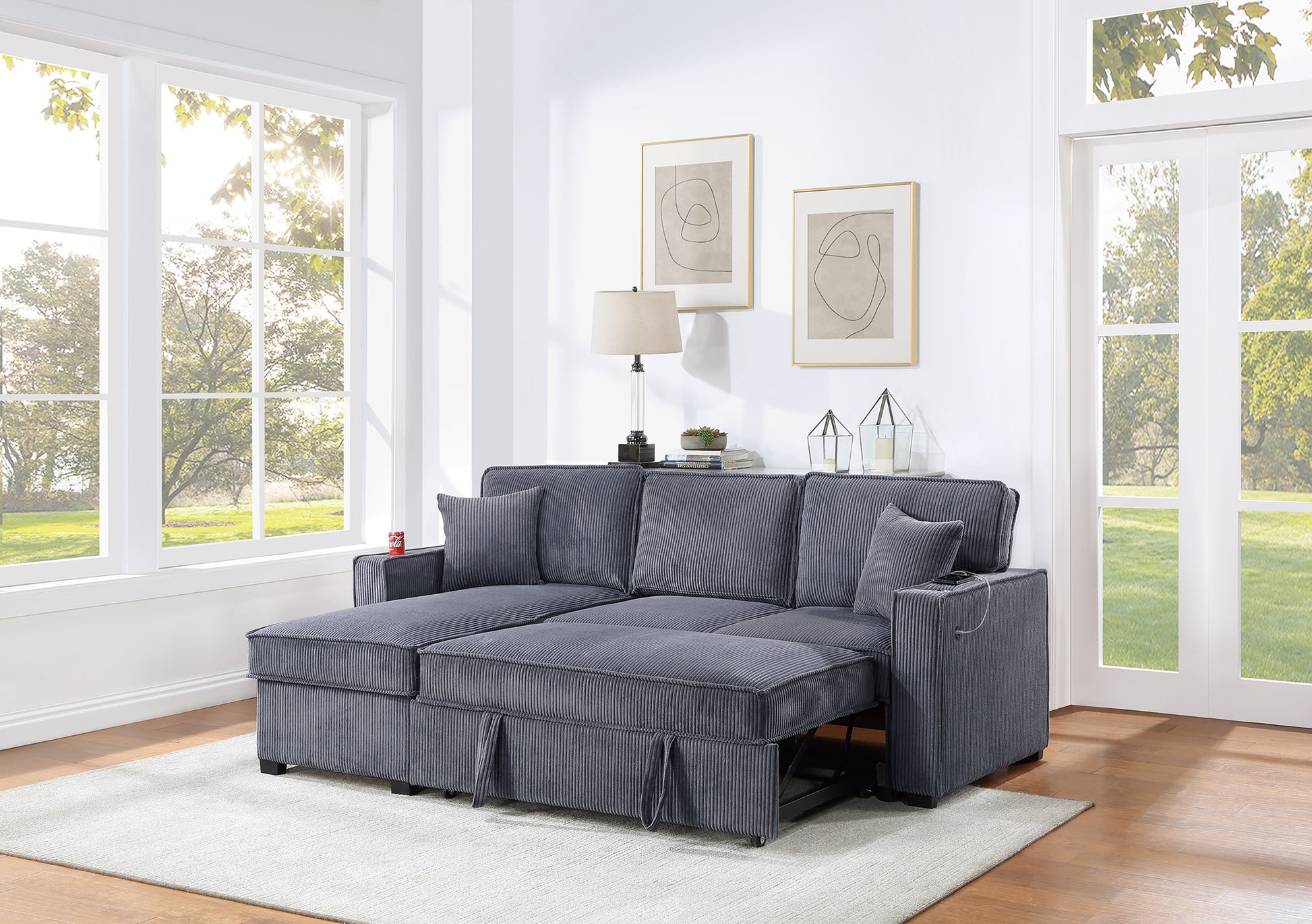 Gray corduroy sectional sofa with pullout bed extended for comfortable lounging