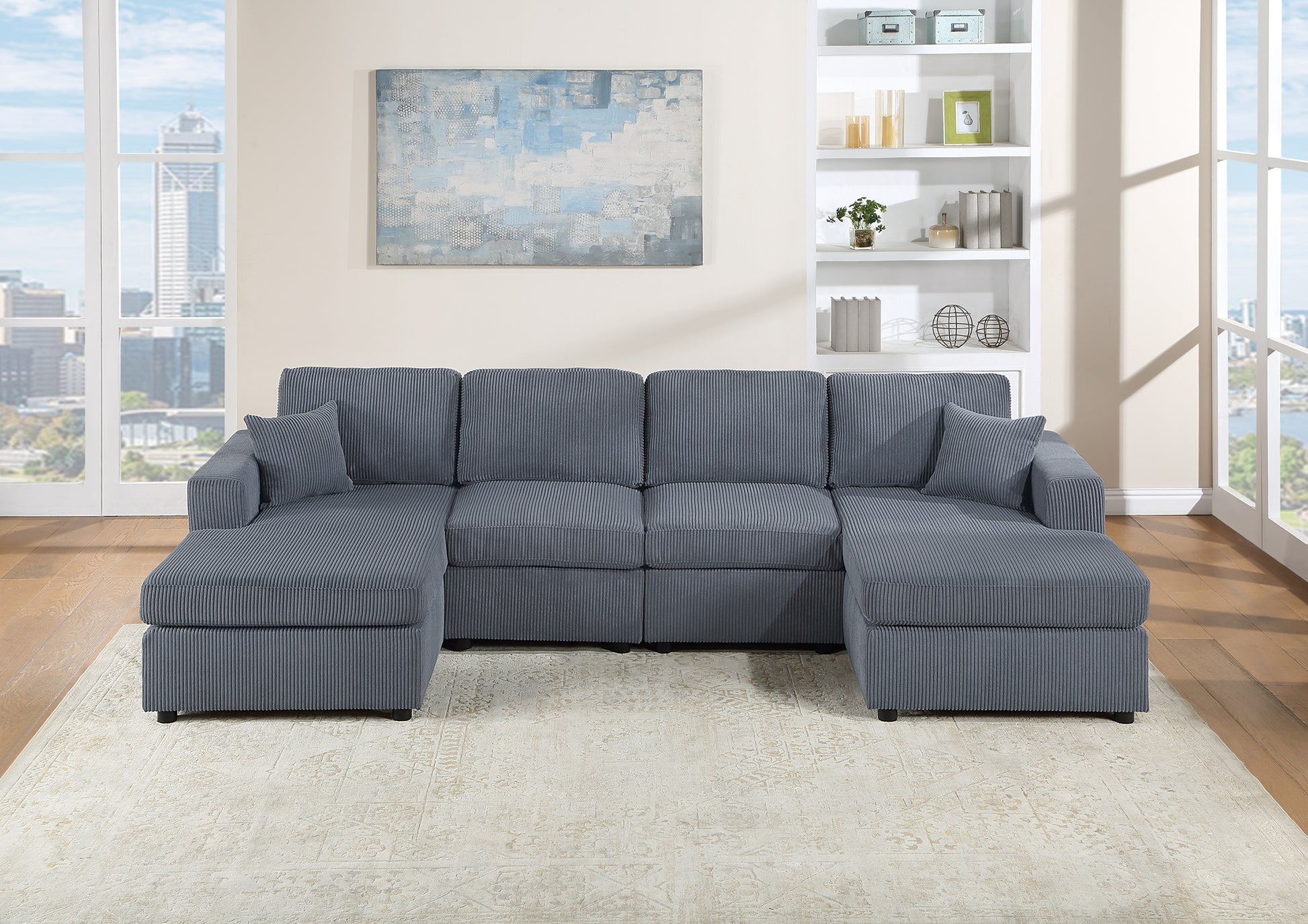 Dark grey corduroy sectional sofa with chaise lounges and accent pillows