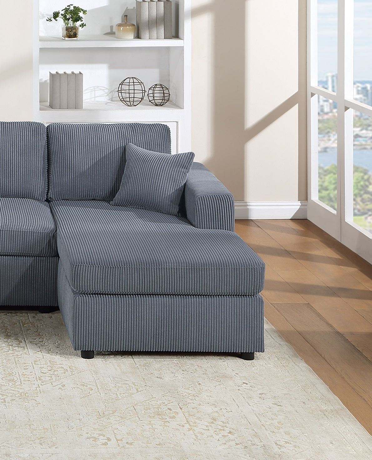 Gray corduroy sectional sofa with chaise lounge ideal for modern living rooms