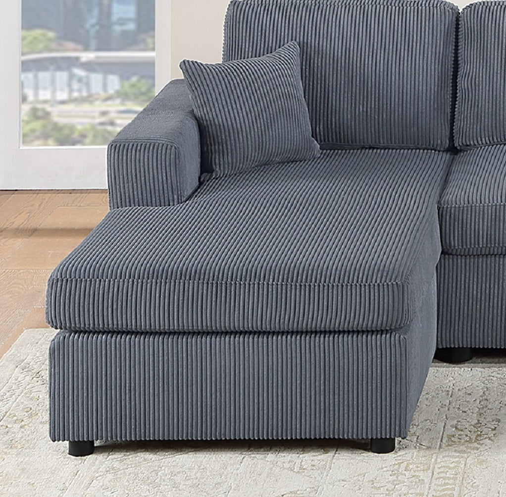 Sectional sofa in charcoal grey corduroy fabric with attached chaise and accent pillow