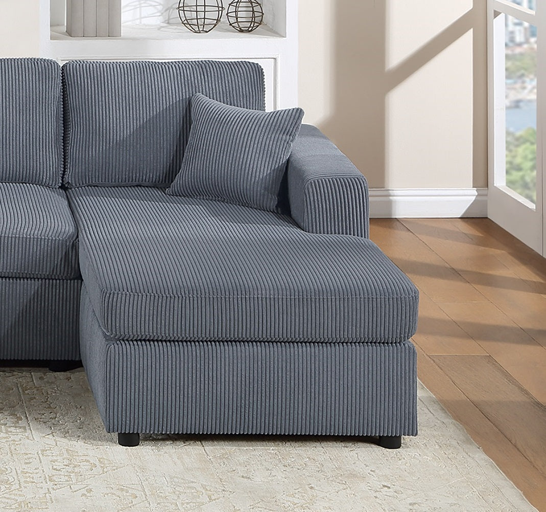 Gray corduroy sectional sofa with chaise lounge and a throw pillow