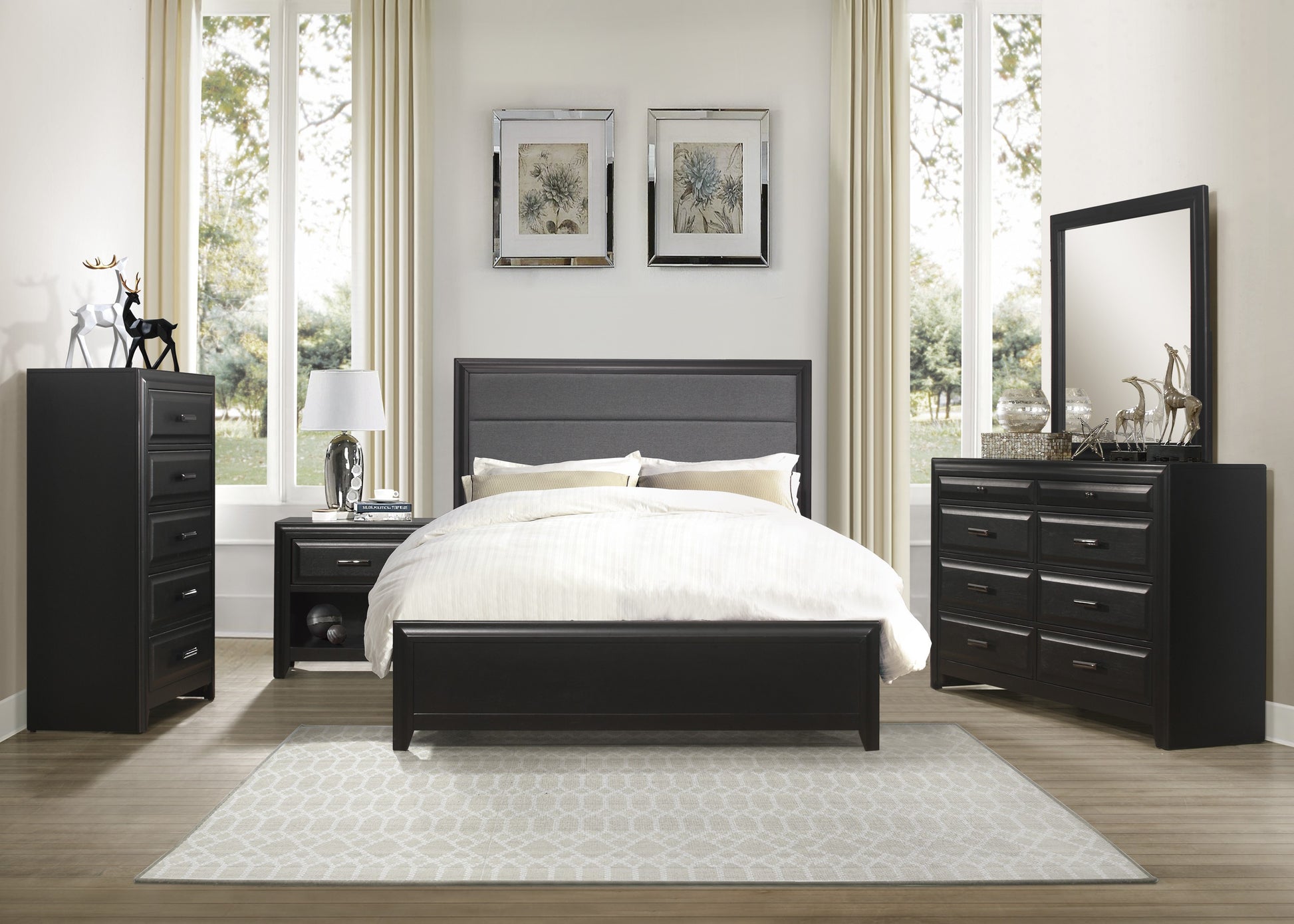 Black wooden bed frame with upholstered headboard and white bedding in a bedroom setting