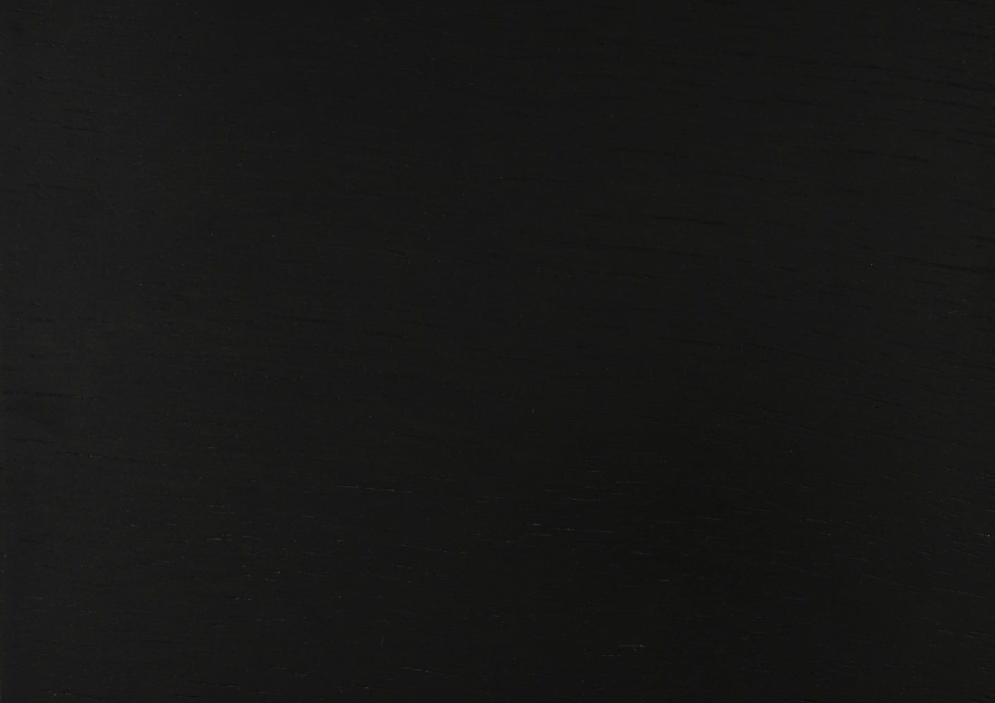 Closeup of dark textured black fabric for upholstery
