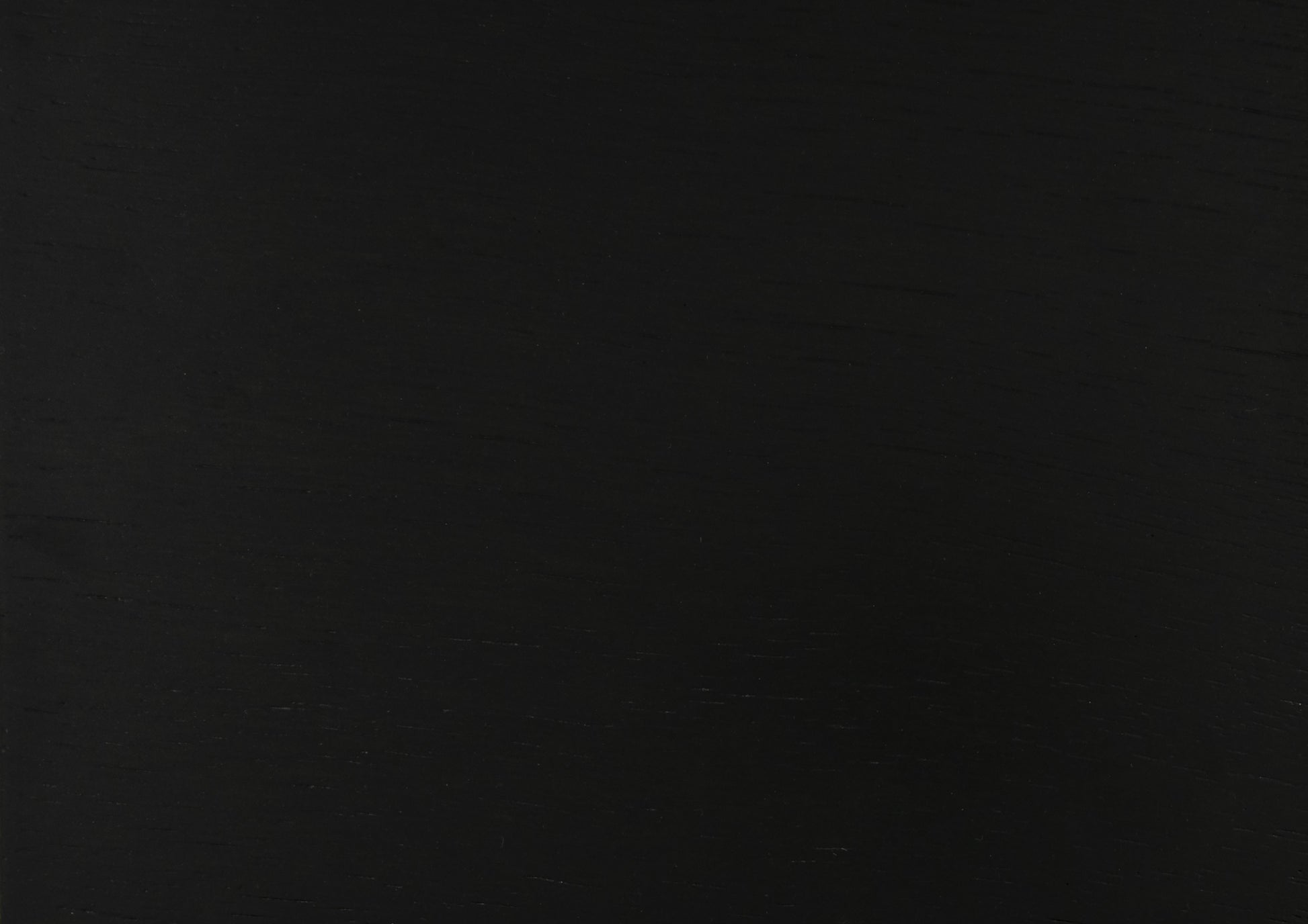Closeup of dark textured black fabric for upholstery