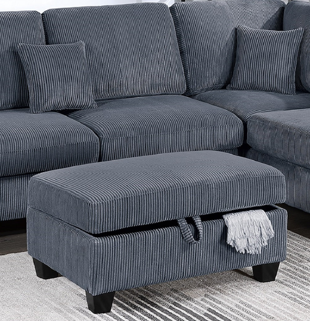Deep blue corduroy storage ottoman with tufted lid and hidden blanket