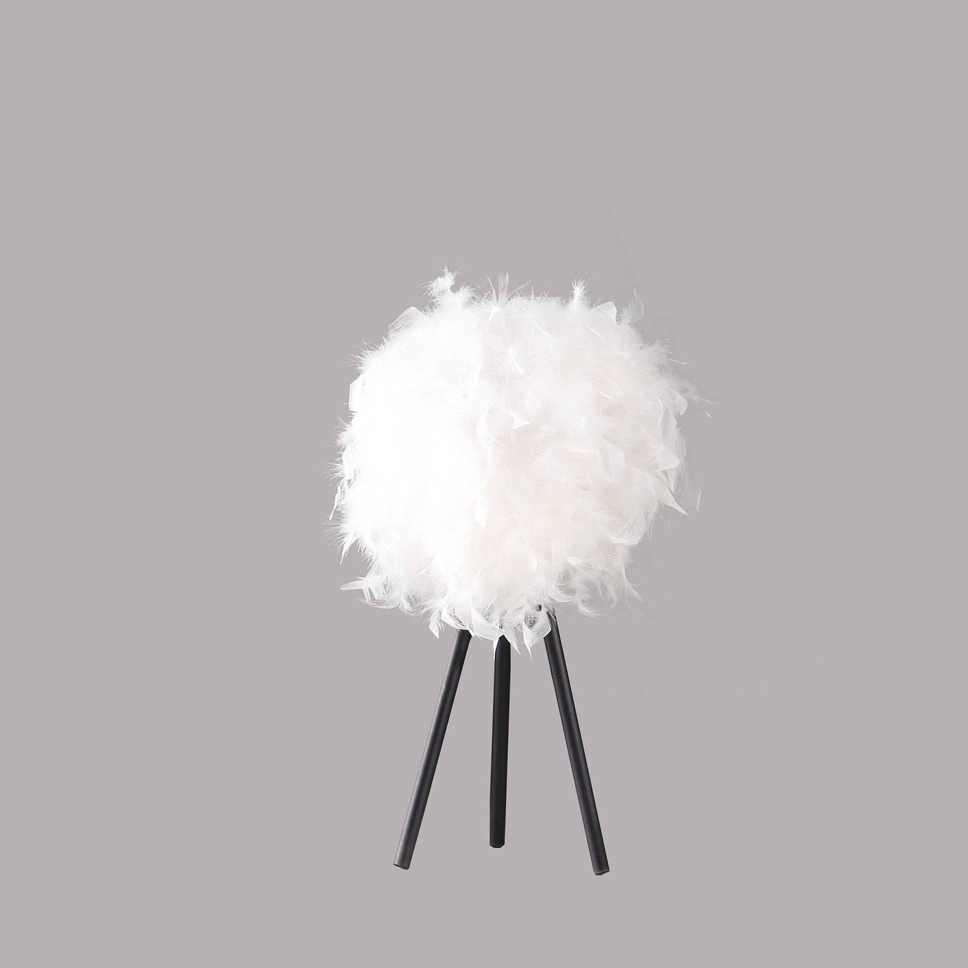 Fluffy white feather table lamp with black tripod base elegant lighting for bedrooms