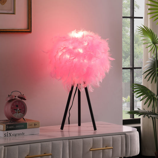 Fluffy pink feather table lamp with modern tripod base on marbletop dresser