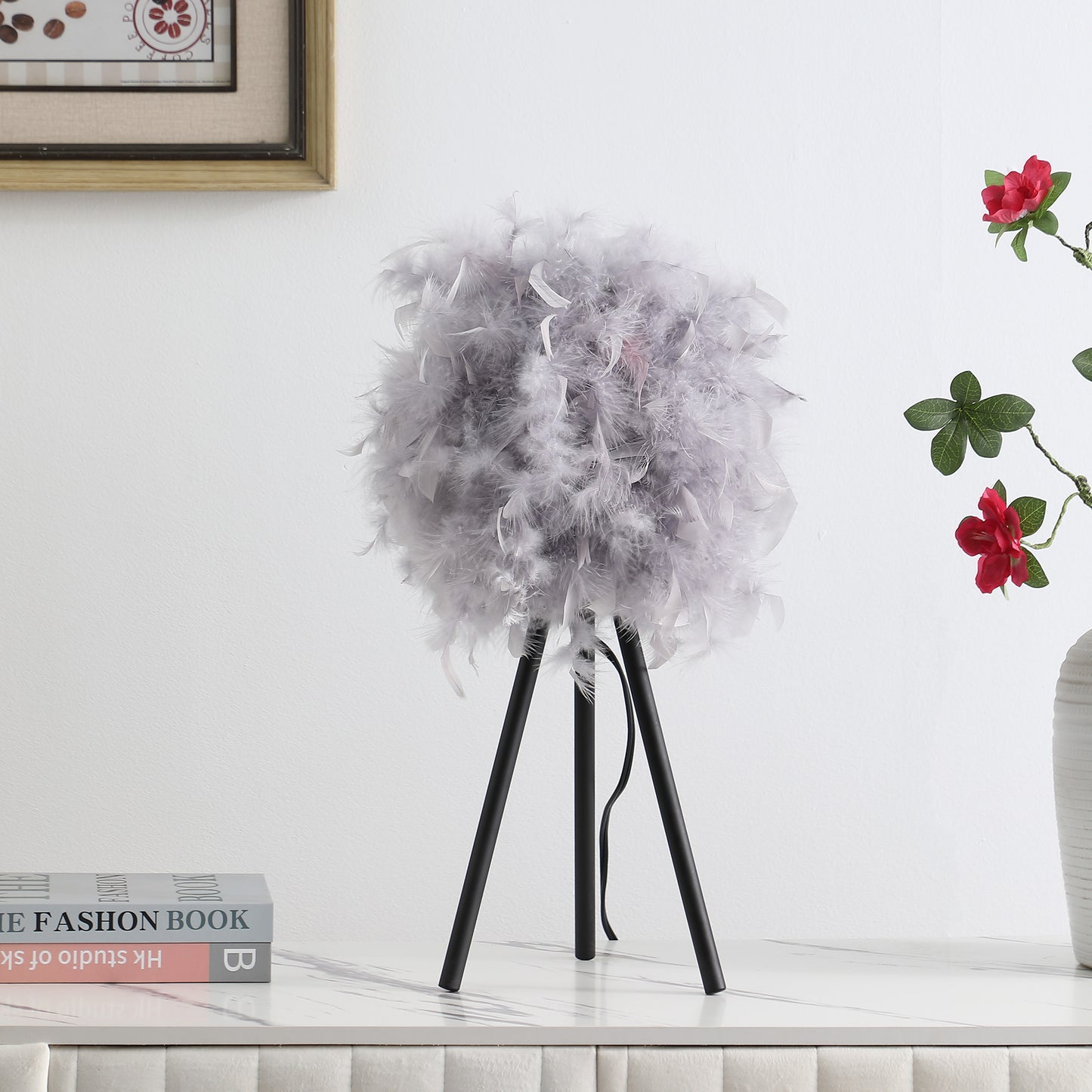 Gray feather lamp with black tripod base and cord modern accent lighting
