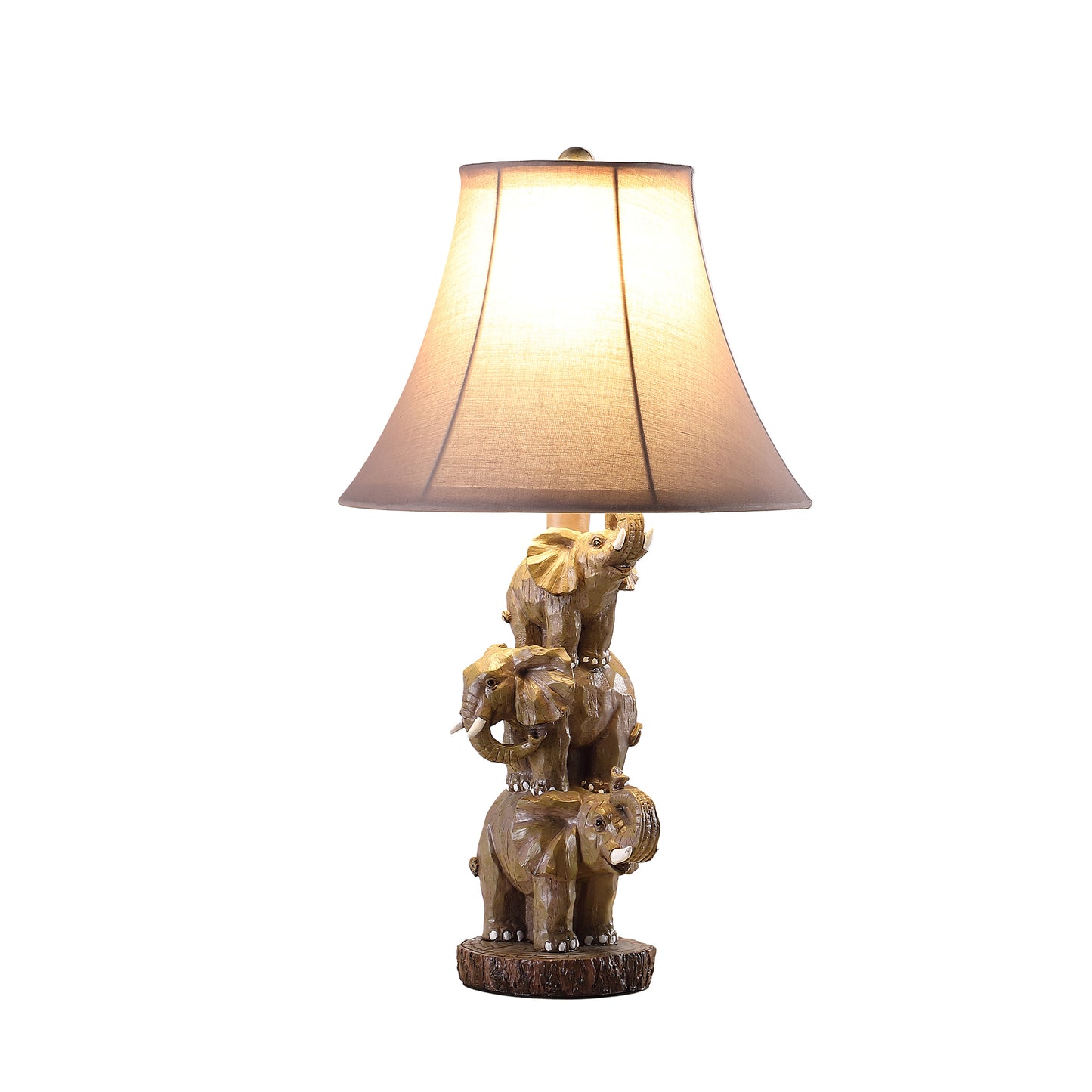 Brown resin table lamp with three stacked elephant figures supporting a burlap shade