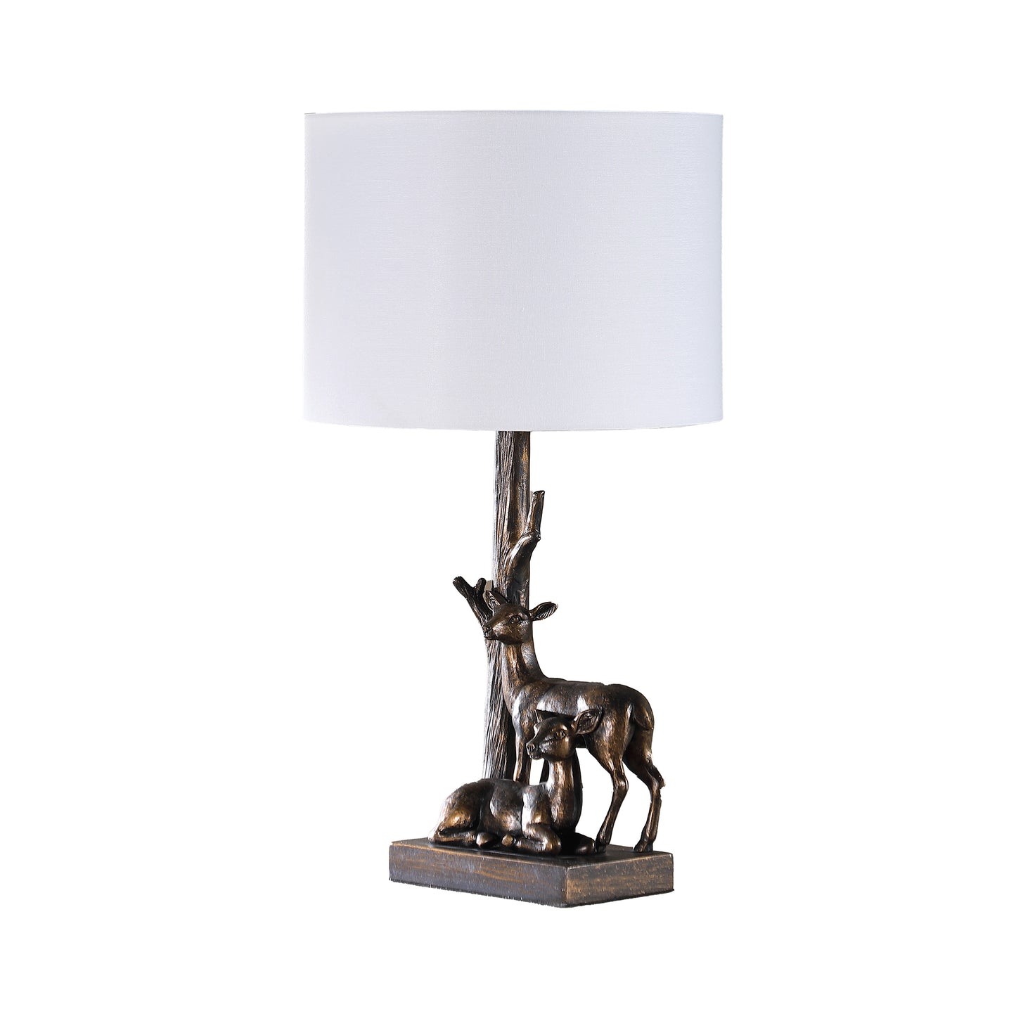 Bronze deer table lamp with a white linen shade and realistic tree trunk base