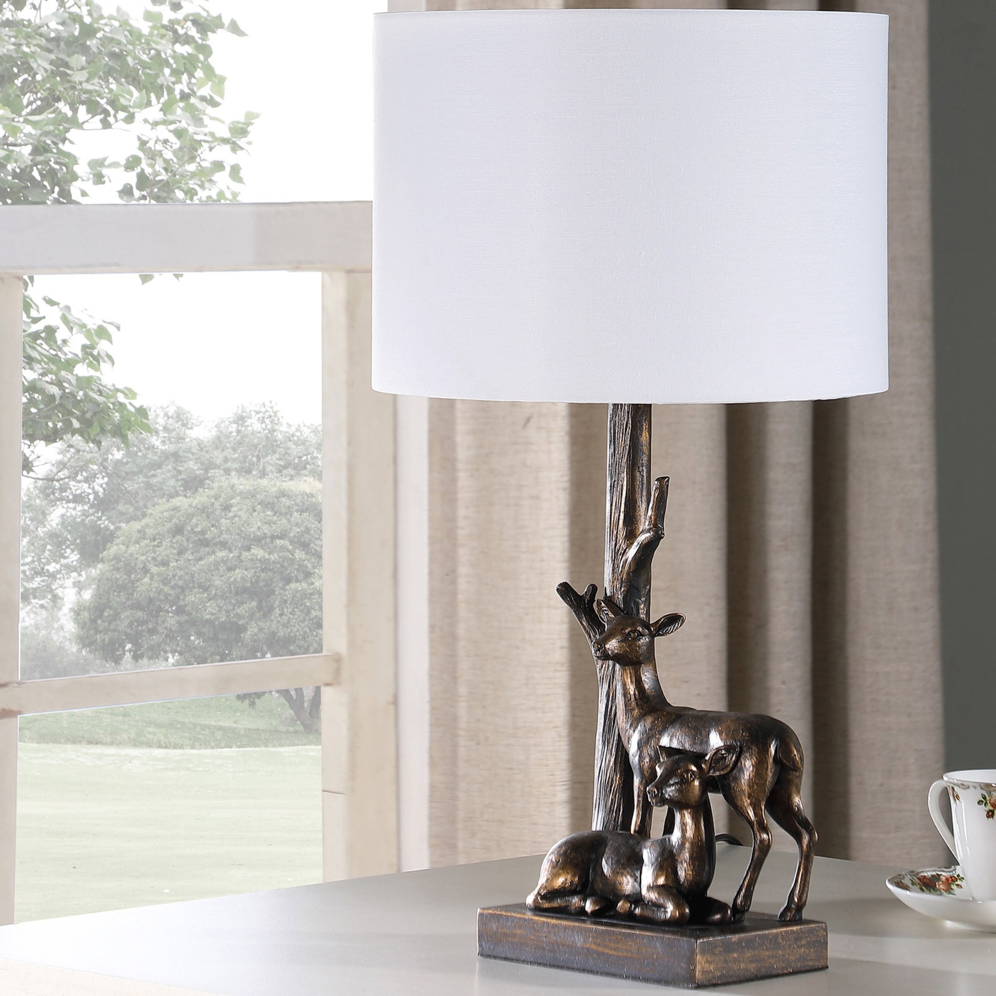 Bronze deer table lamp with white shade woodland accent light