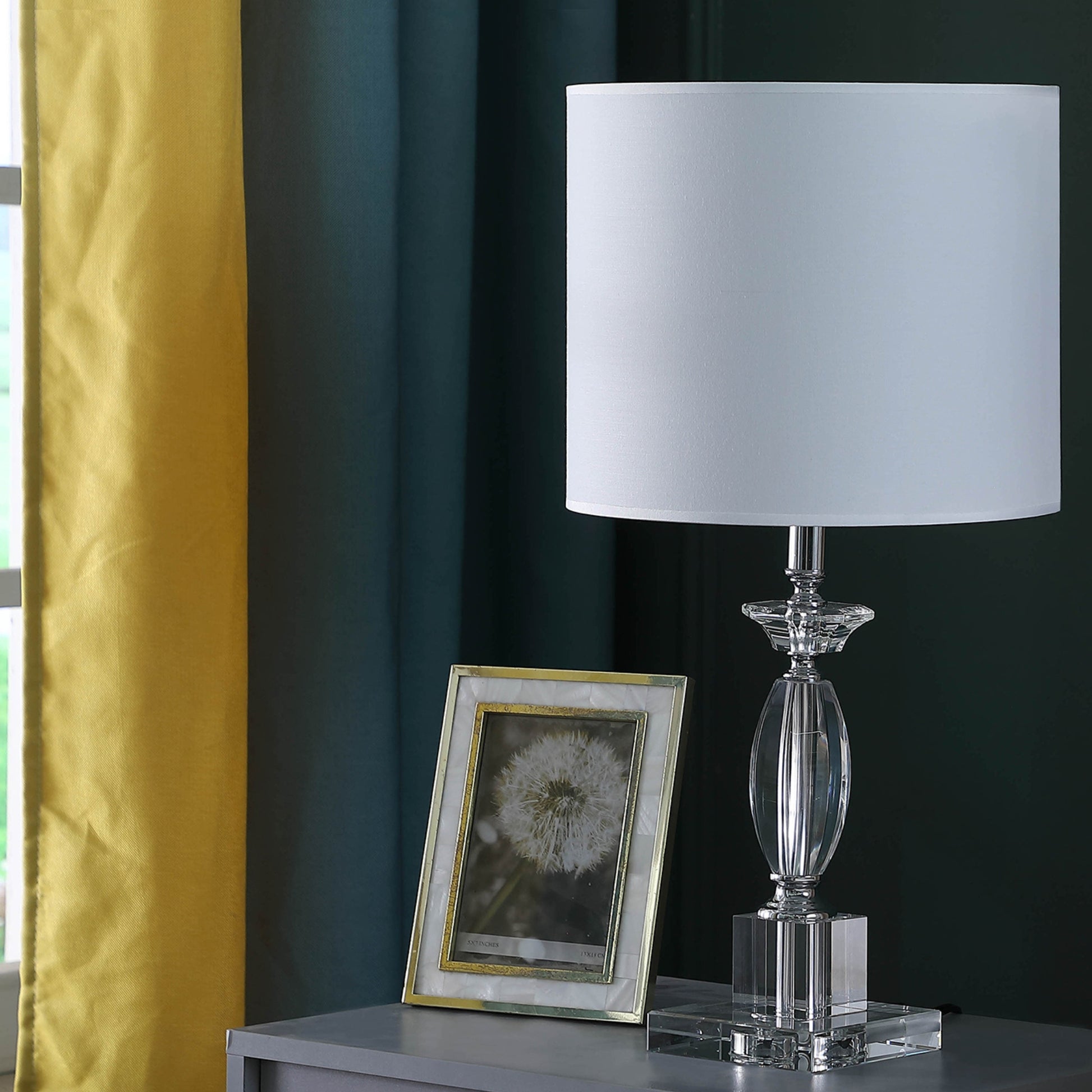 Crystal base table lamp with white drum shade and golden inlaid photo frame