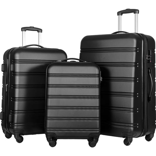 Three black hardshell suitcases with telescoping handles and four spinner wheels