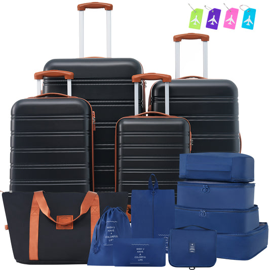 Black hardshell luggage set with brown accents and travel accessories