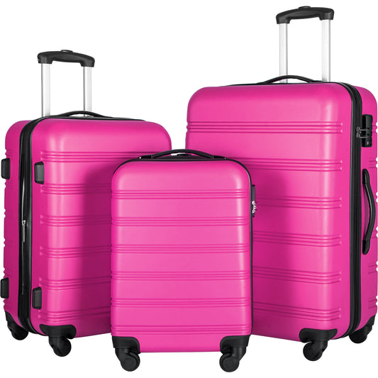 Three pink hardshell suitcases with spinner wheels and telescoping handles