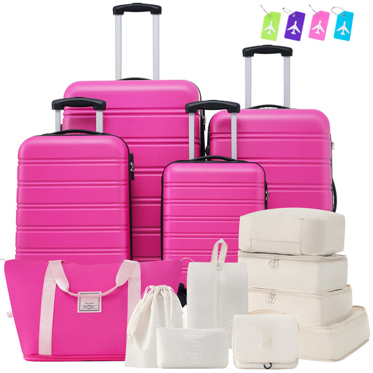 Hot pink hardside luggage set with matching travel tote and organizers