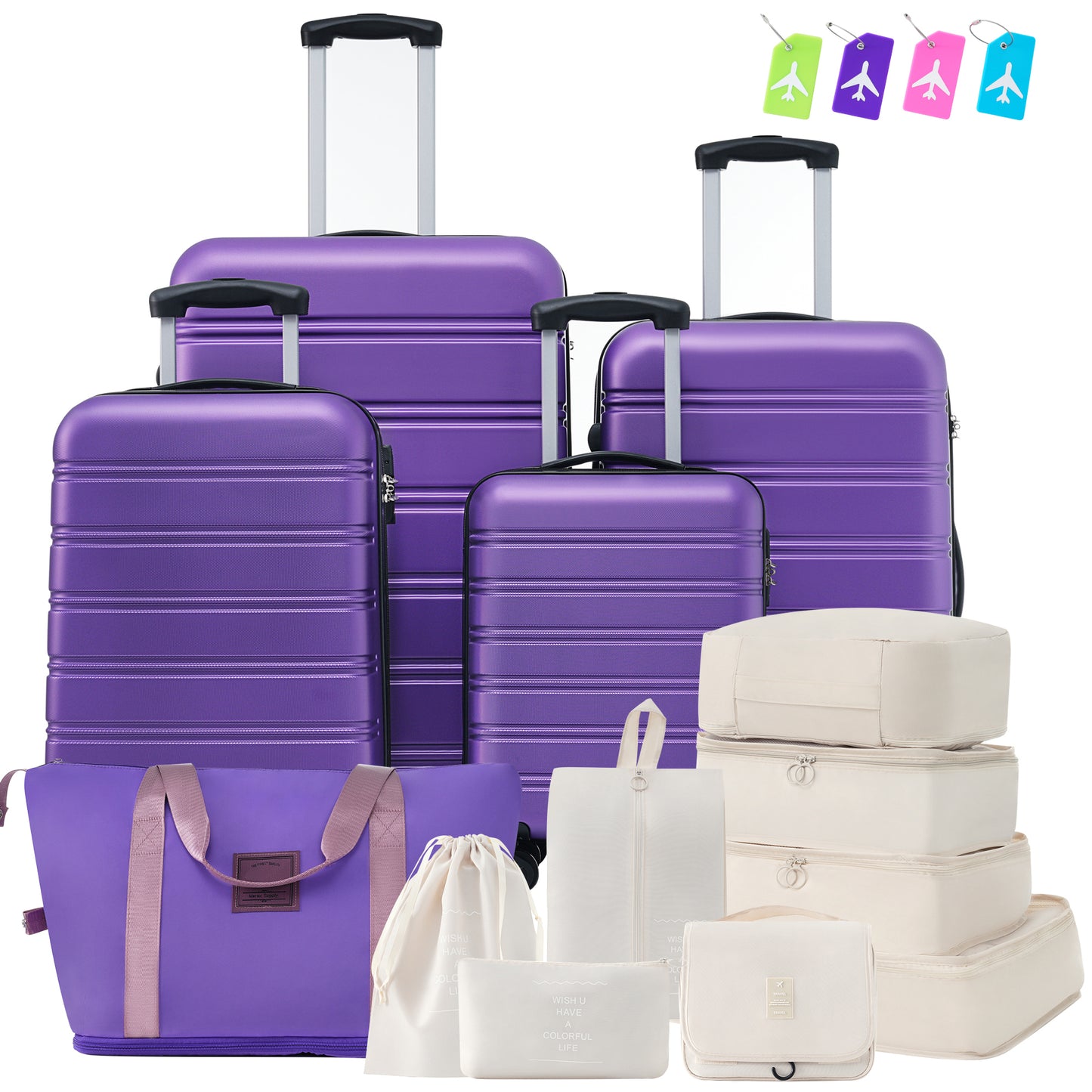 Set of four purple hard shell suitcases and travel organizers