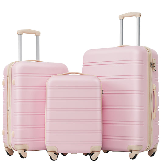 Three pink hardside suitcases in varying sizes perfect for travel