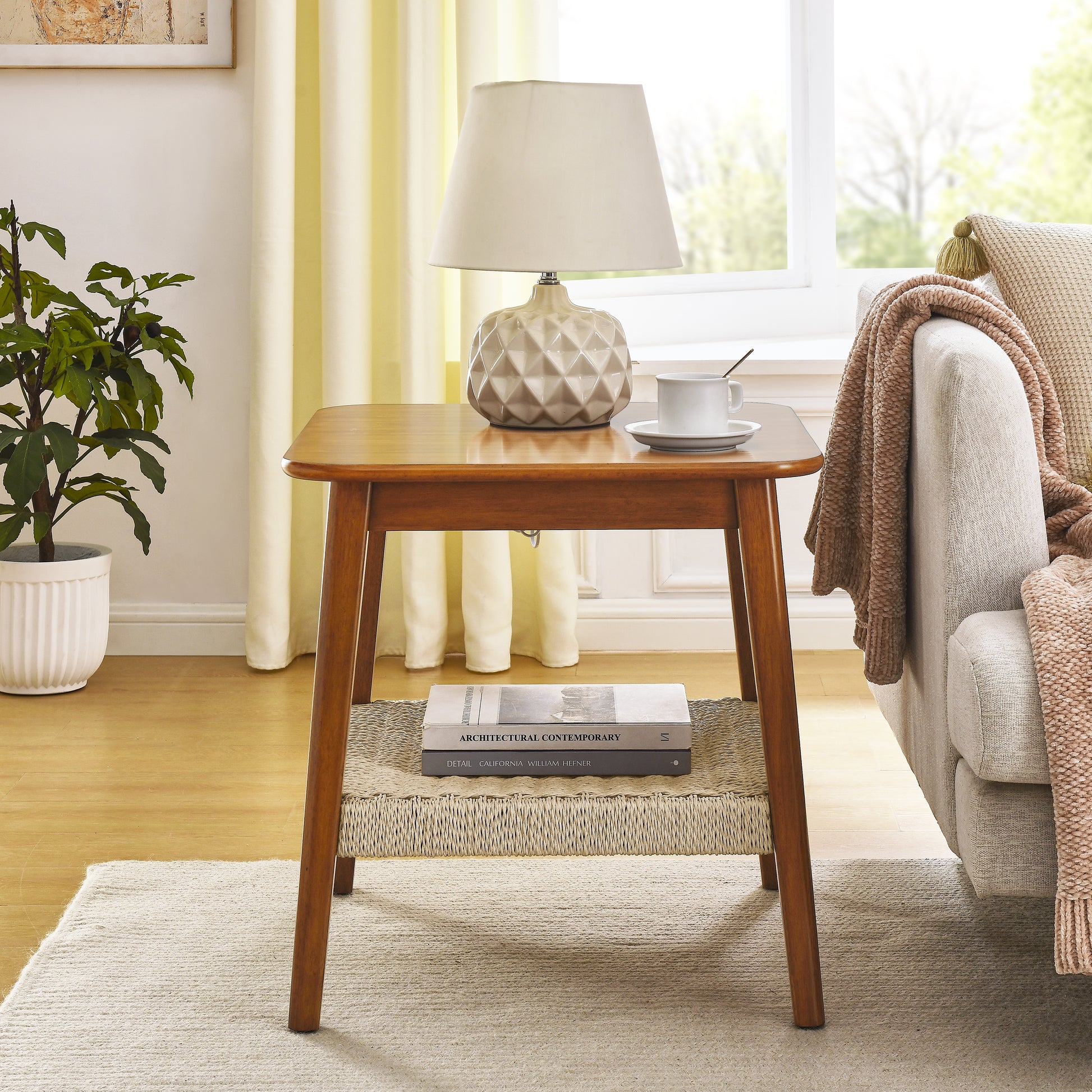 Midcentury modern wooden end table with woven shelf and contemporary lamp