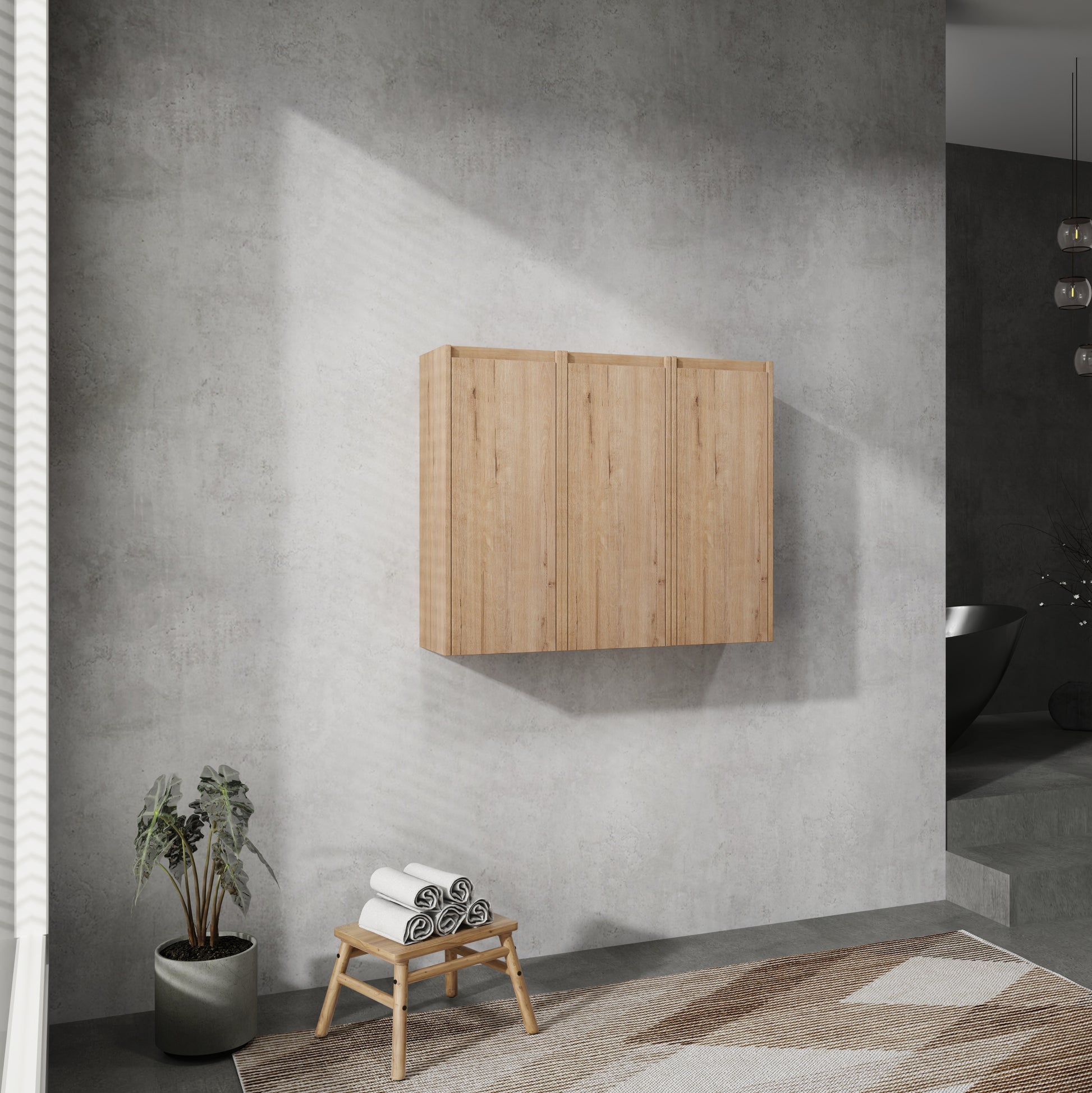 Light oak bathroom vanity with three doors and modern design mounted on a textured gray wall