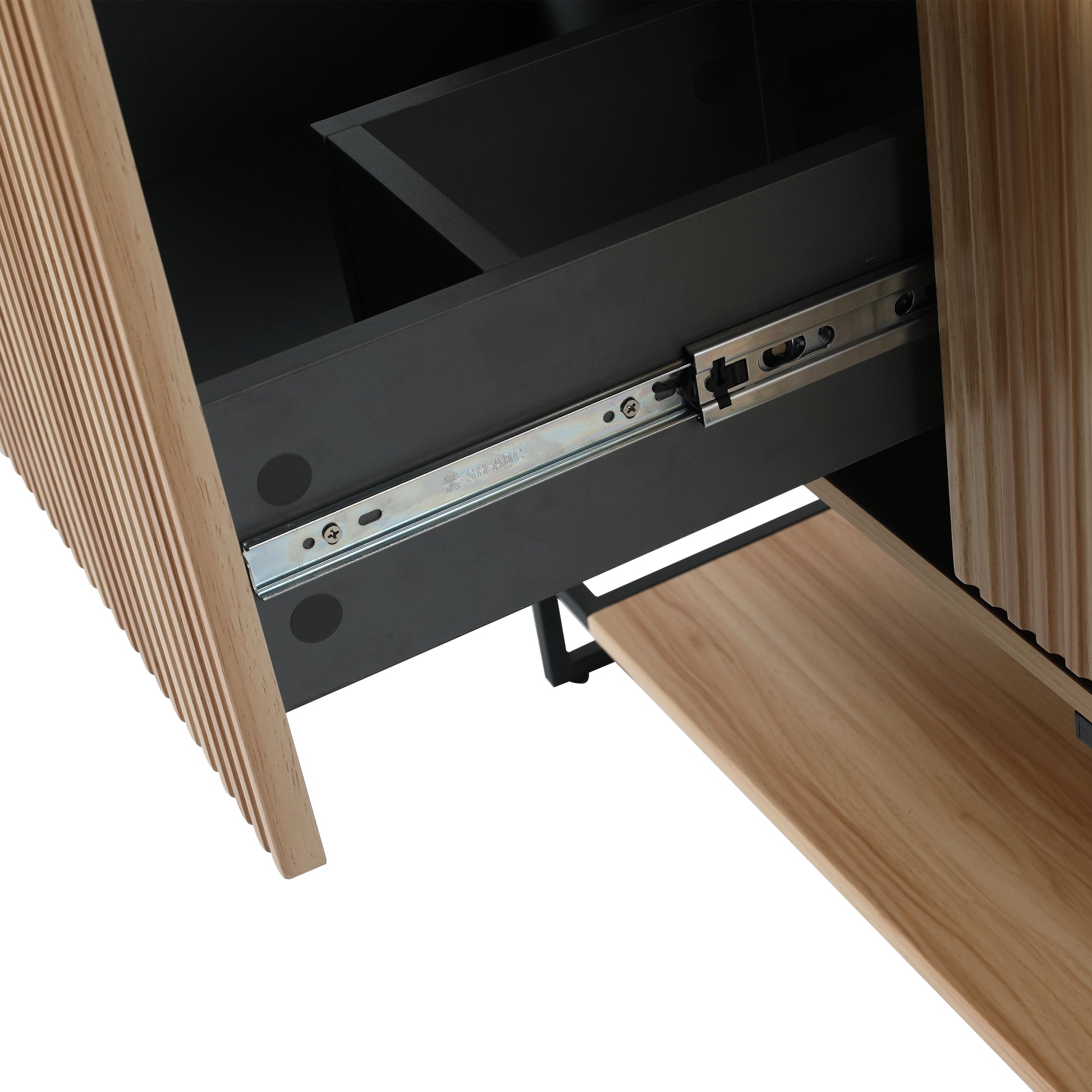 Modern wood cabinet with ribbed detail showing a partially extended dark drawer and metal slide