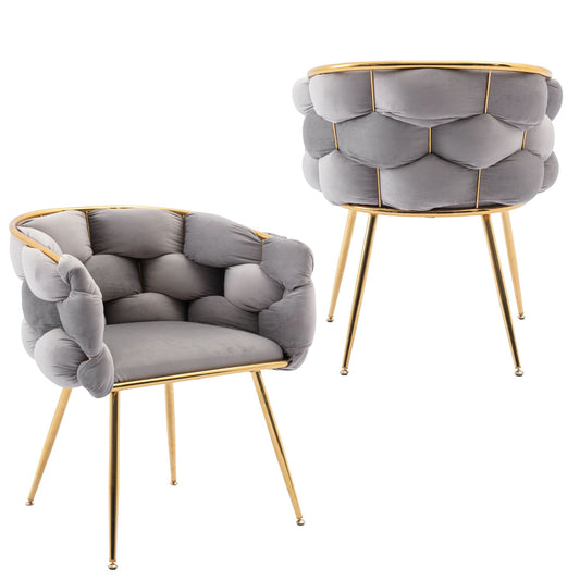 Grey tufted velvet accent chair with gold metal legs and contemporary design