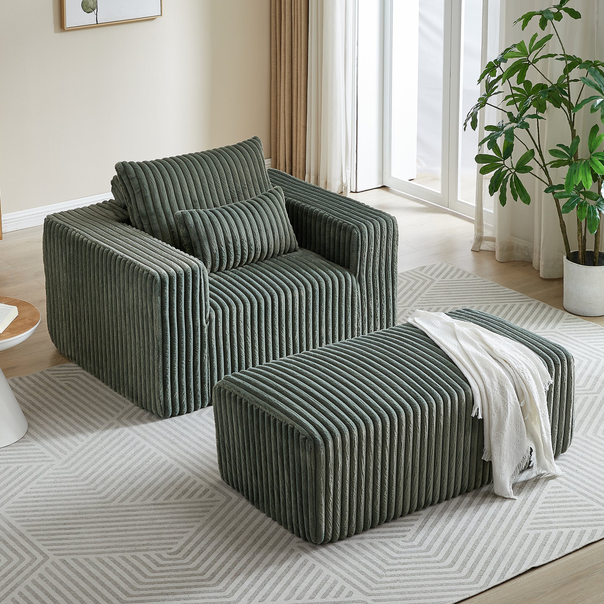 Plush corduroy armchair in sage green featuring a unique textured design and comfortable seating for modern living rooms