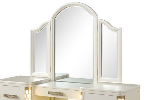 Antique white vanity table with trifold mirror and decorative drawer pulls