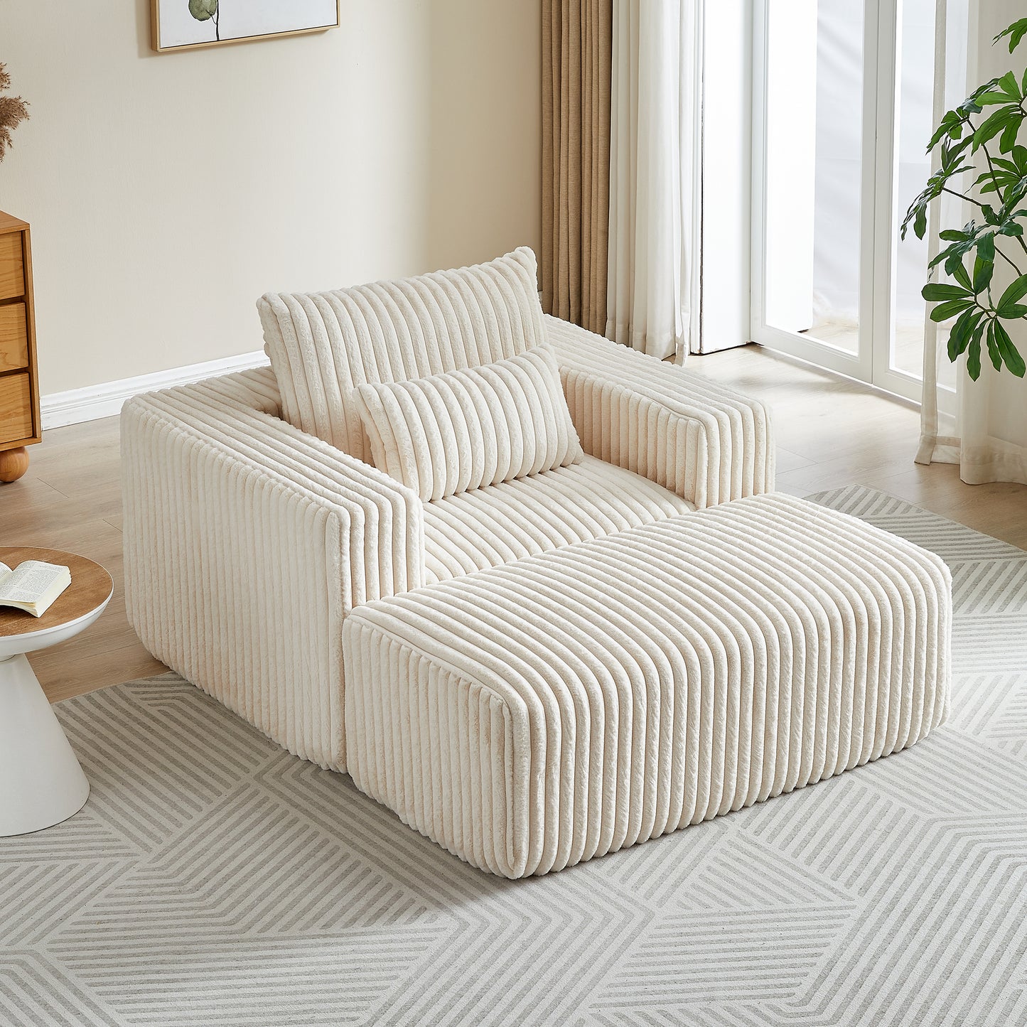 Cream corduroy accent chair with matching ottoman and throw pillow