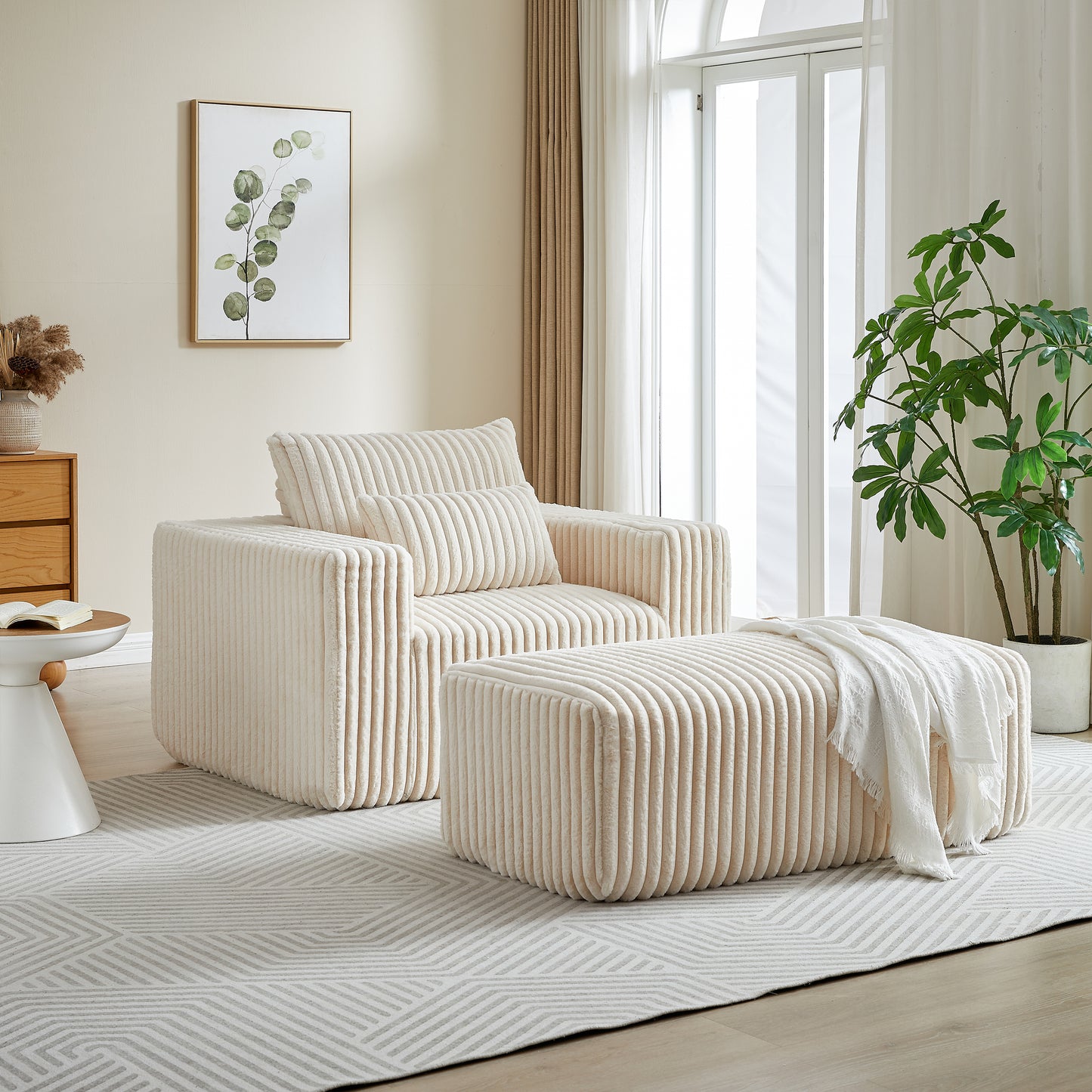 Cream corduroy armchair with ribbed texture and matching ottoman perfect for a cozy living room
