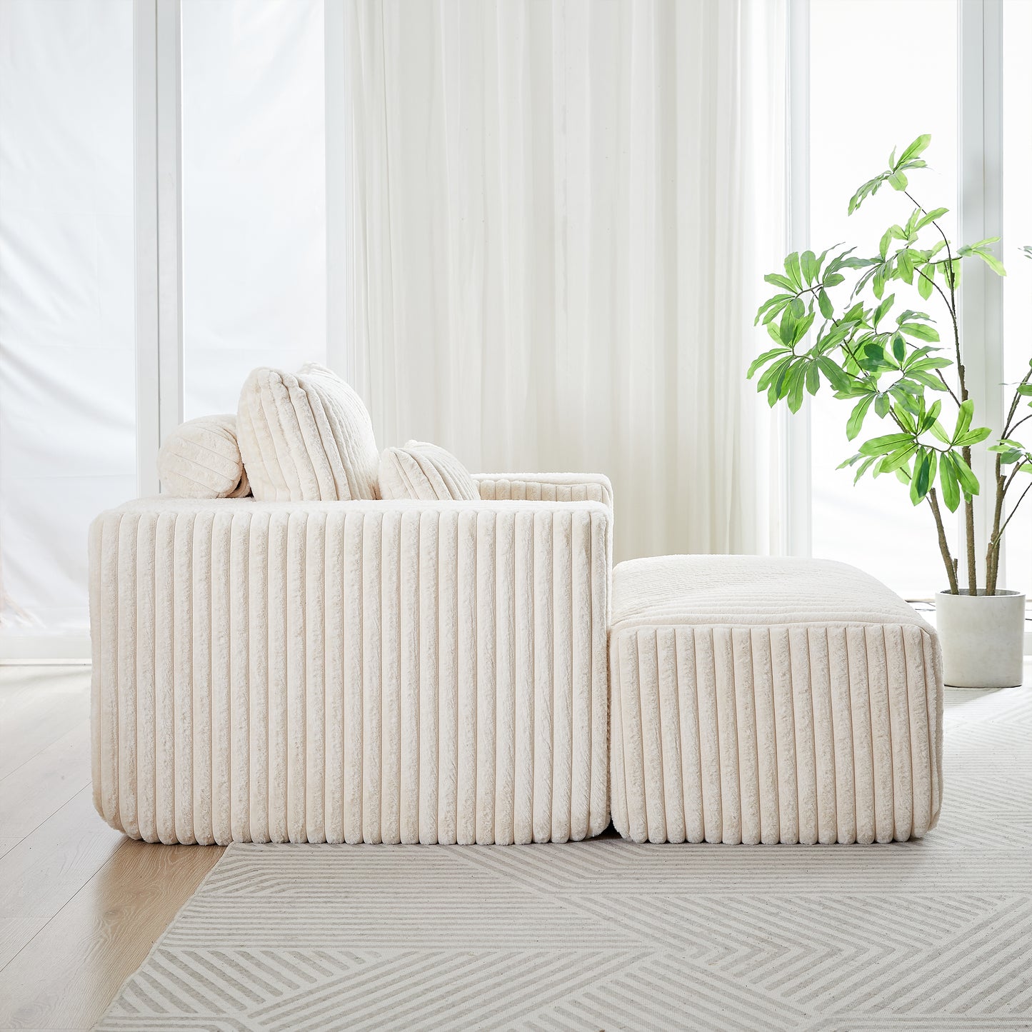 Plush cream sectional sofa with ribbed texture and plush throw pillows modern living room style