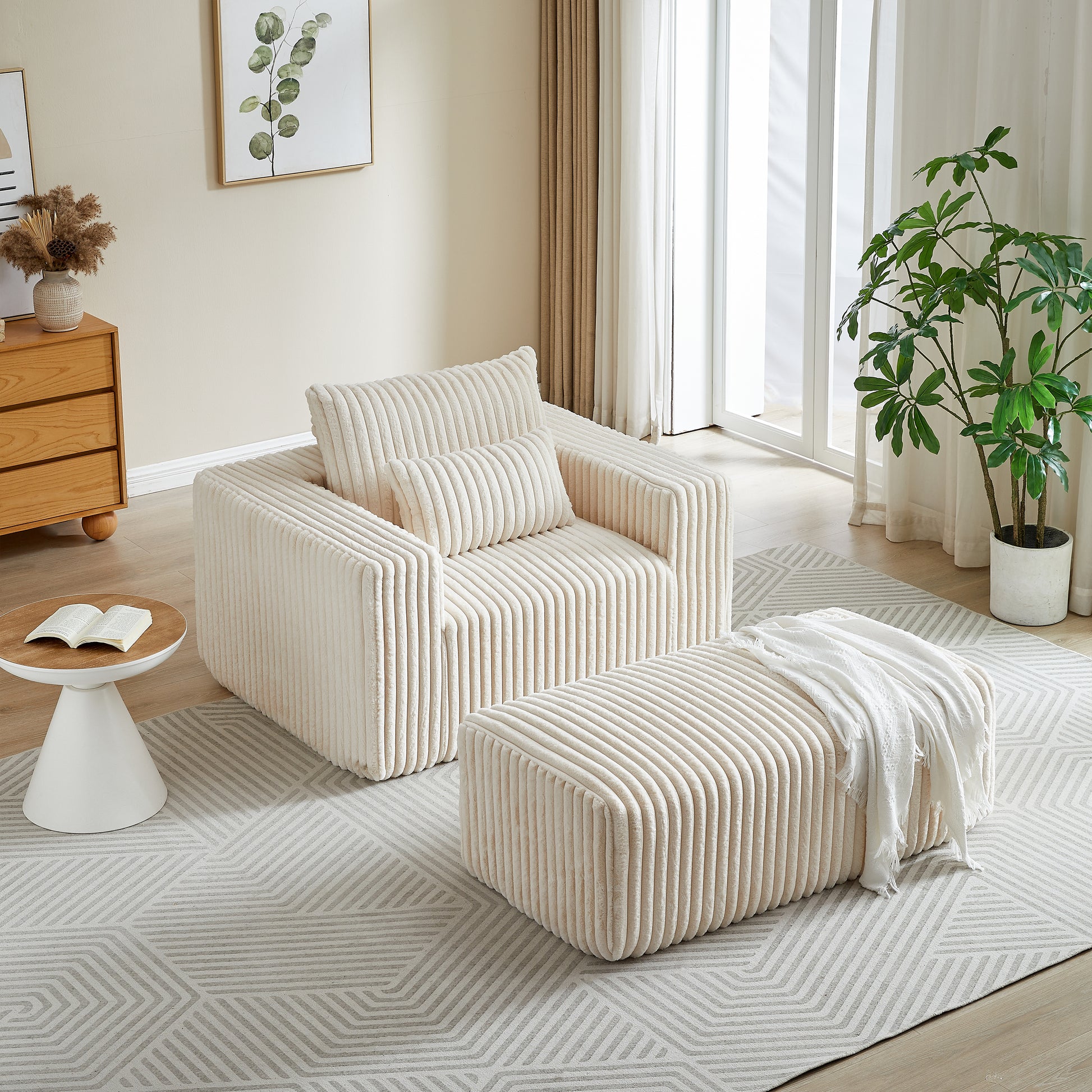 Plush cream corduroy armchair with matching ottoman perfect for a cozy living room