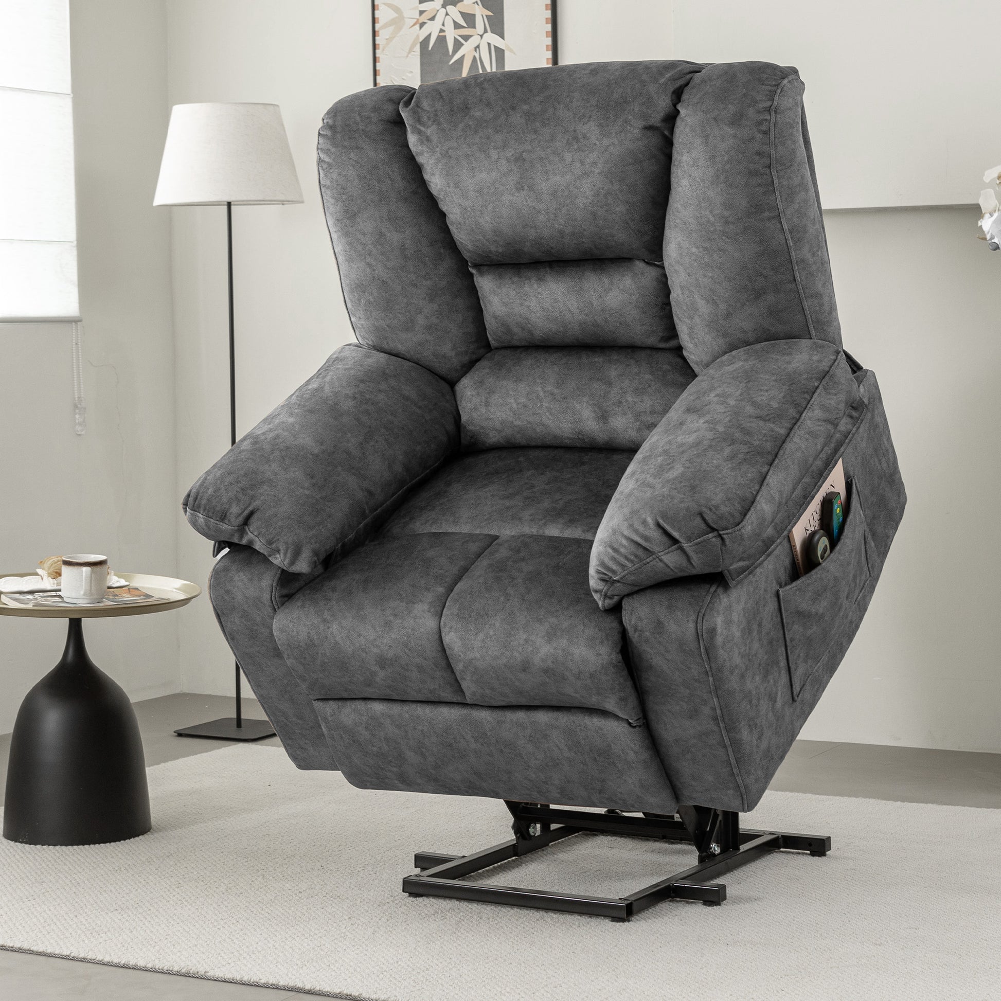 Plush gray lift chair recliner with deep cushioning and convenient side pocket for remote