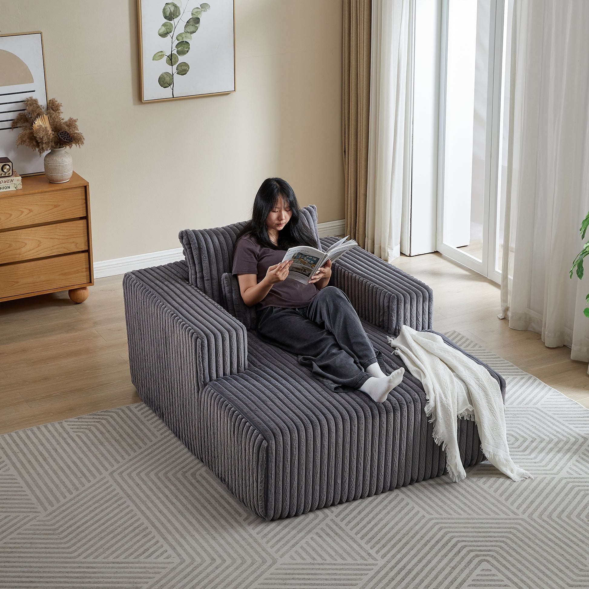 Gray corduroy sectional sofa with a chaise lounge perfect for a modern living room