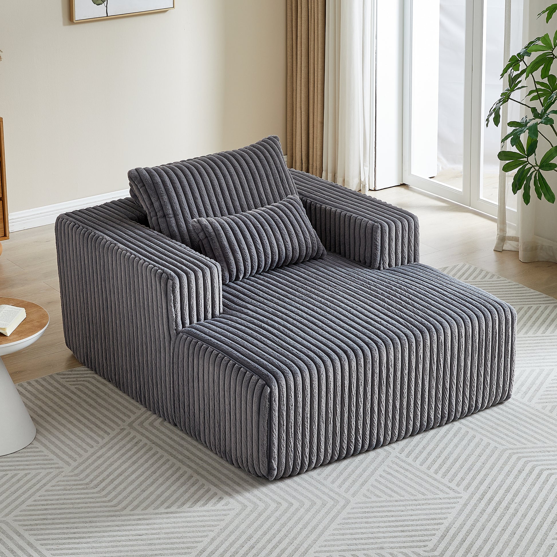Plush grey corduroy sectional sofa with a modern lowprofile design