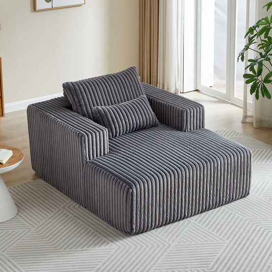Plush grey corduroy sectional sofa with a modern lowprofile design