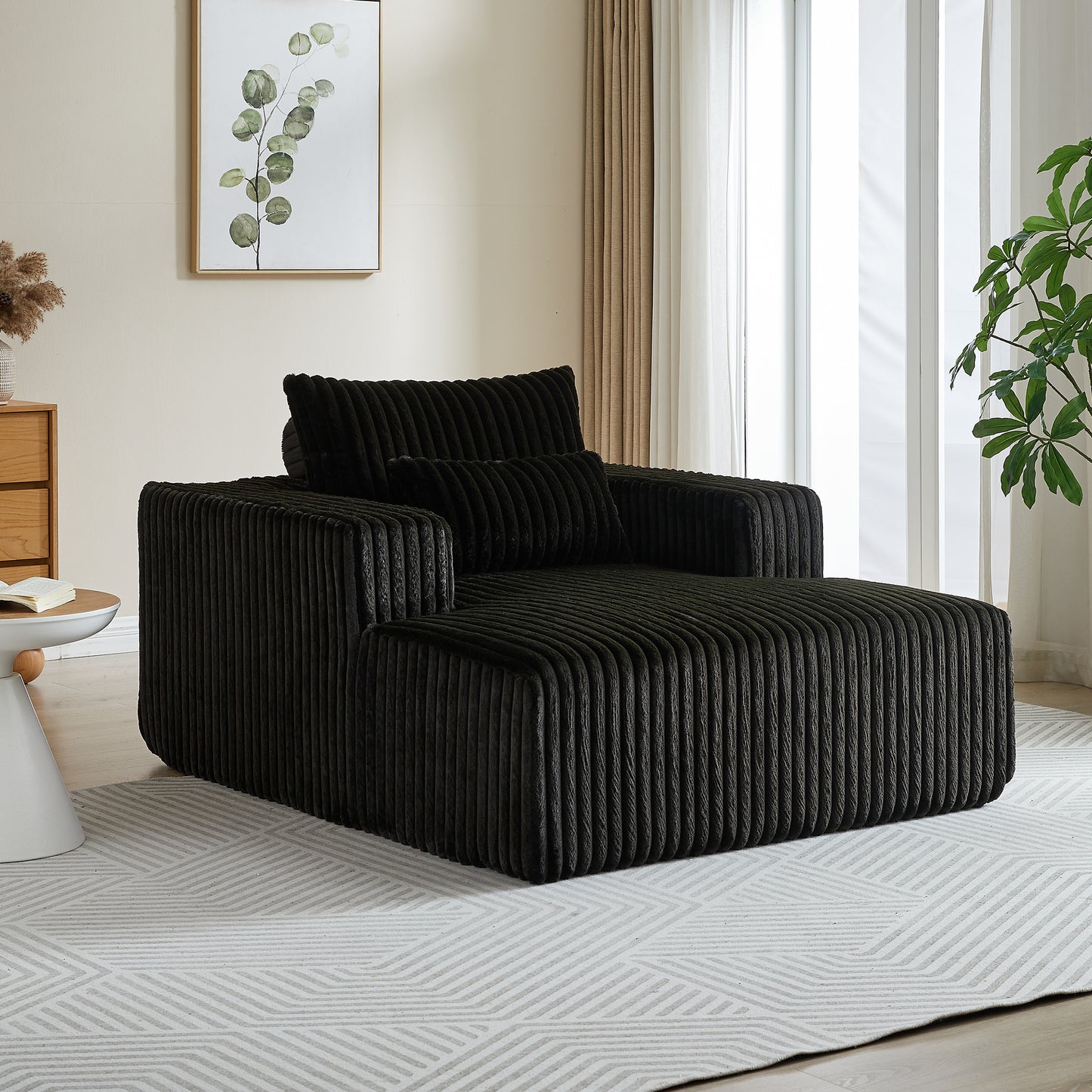 Black corduroy chaise lounge with plush cushions modern style accent piece