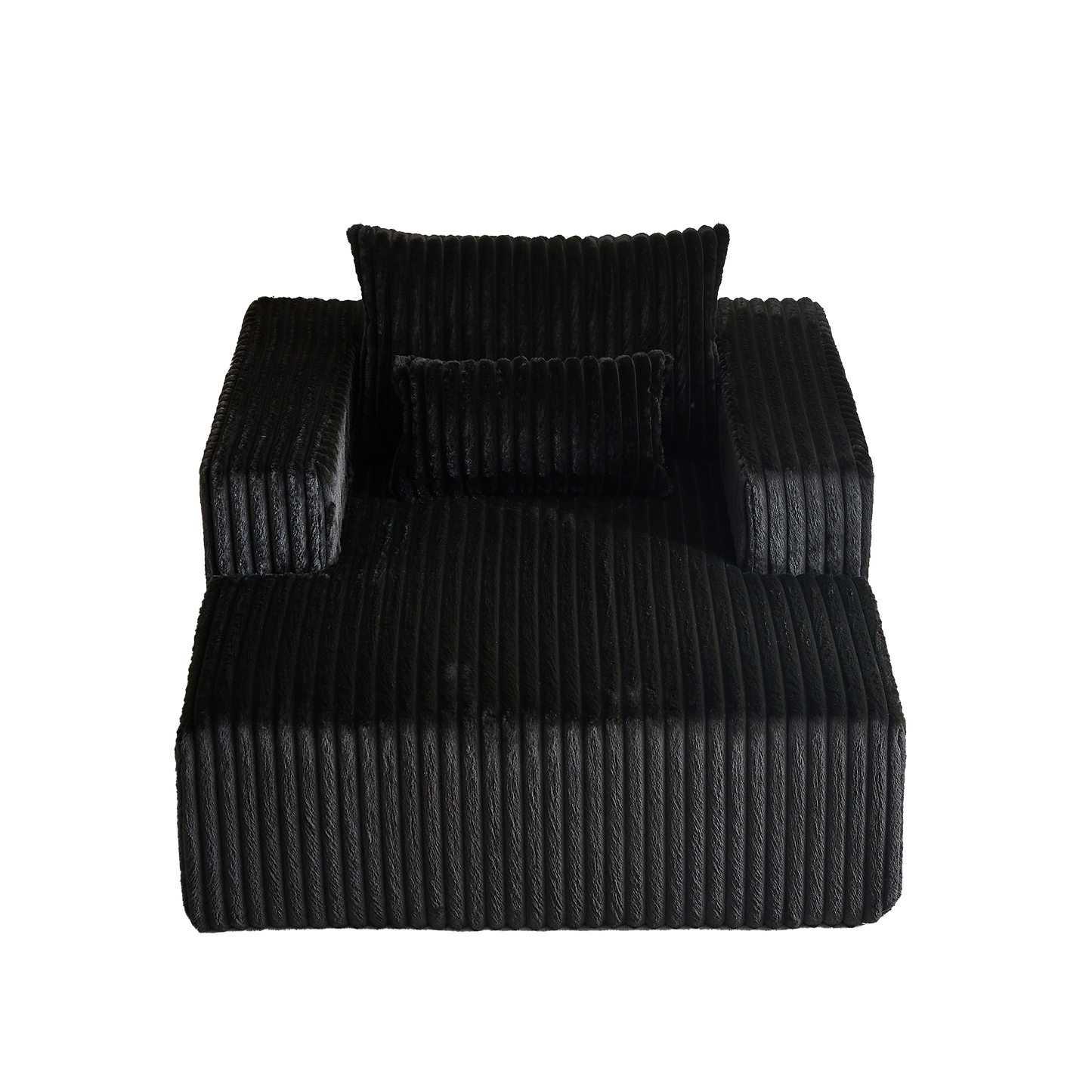 Black plush sofa with corduroy texture and two throw pillows