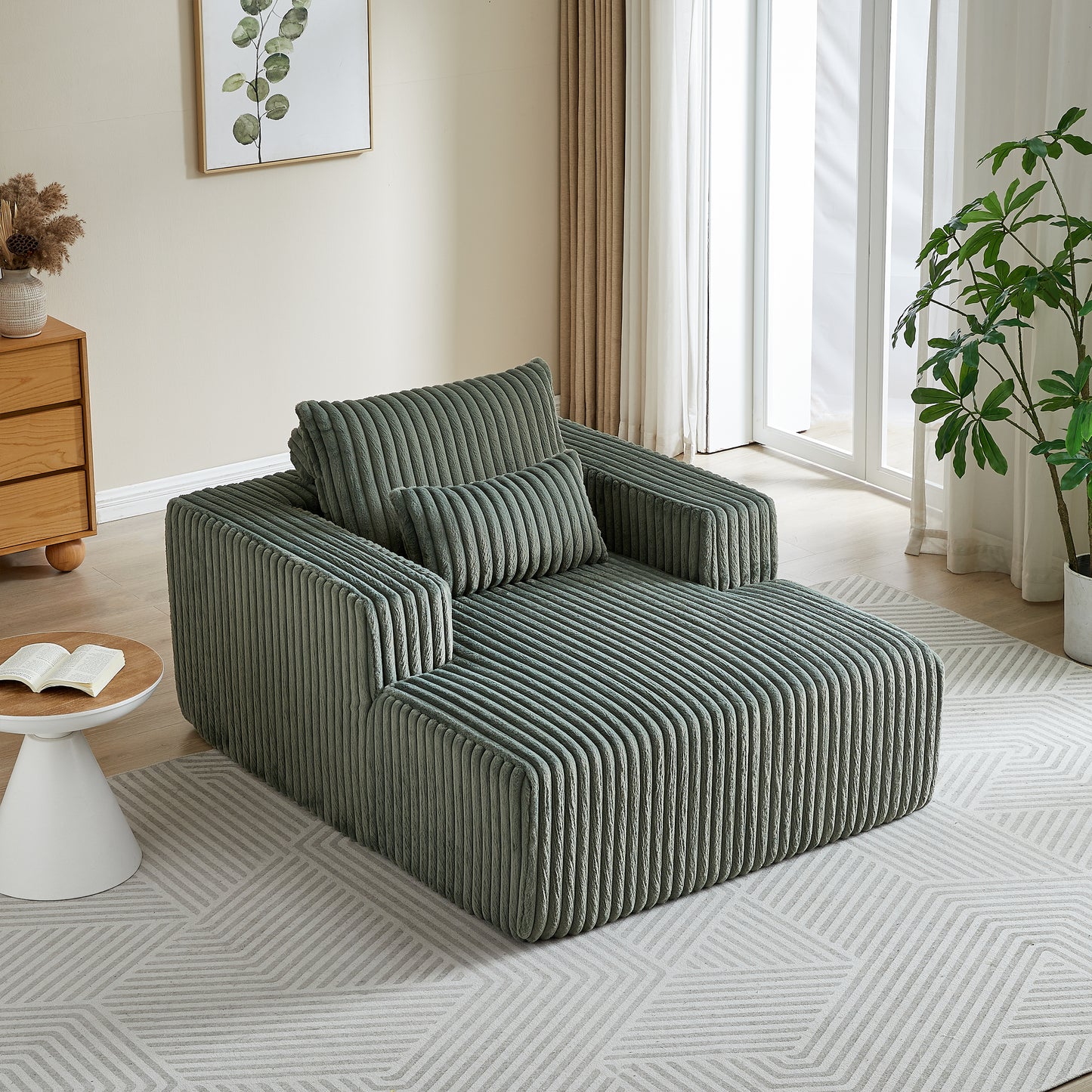 Sage green corduroy sectional sofa with plush cushions and modern low profile design