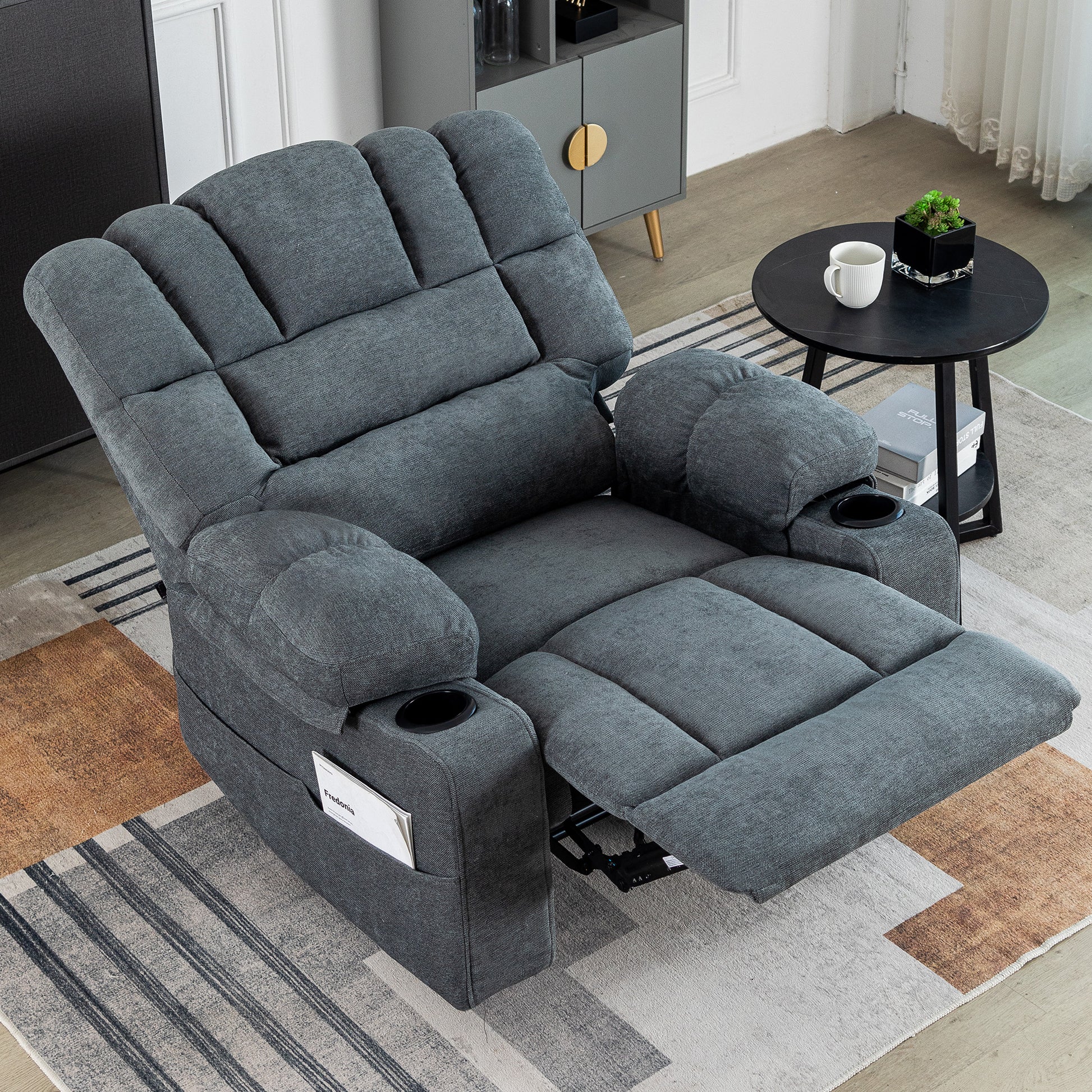 Dark gray upholstered recliner chair with plush padding cup holders and side pocket