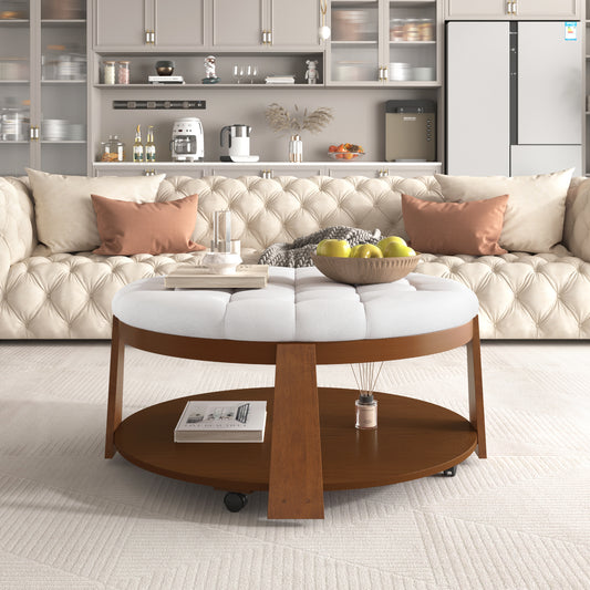 Tufted cream upholstered ottoman coffee table with dark wood base and wheels